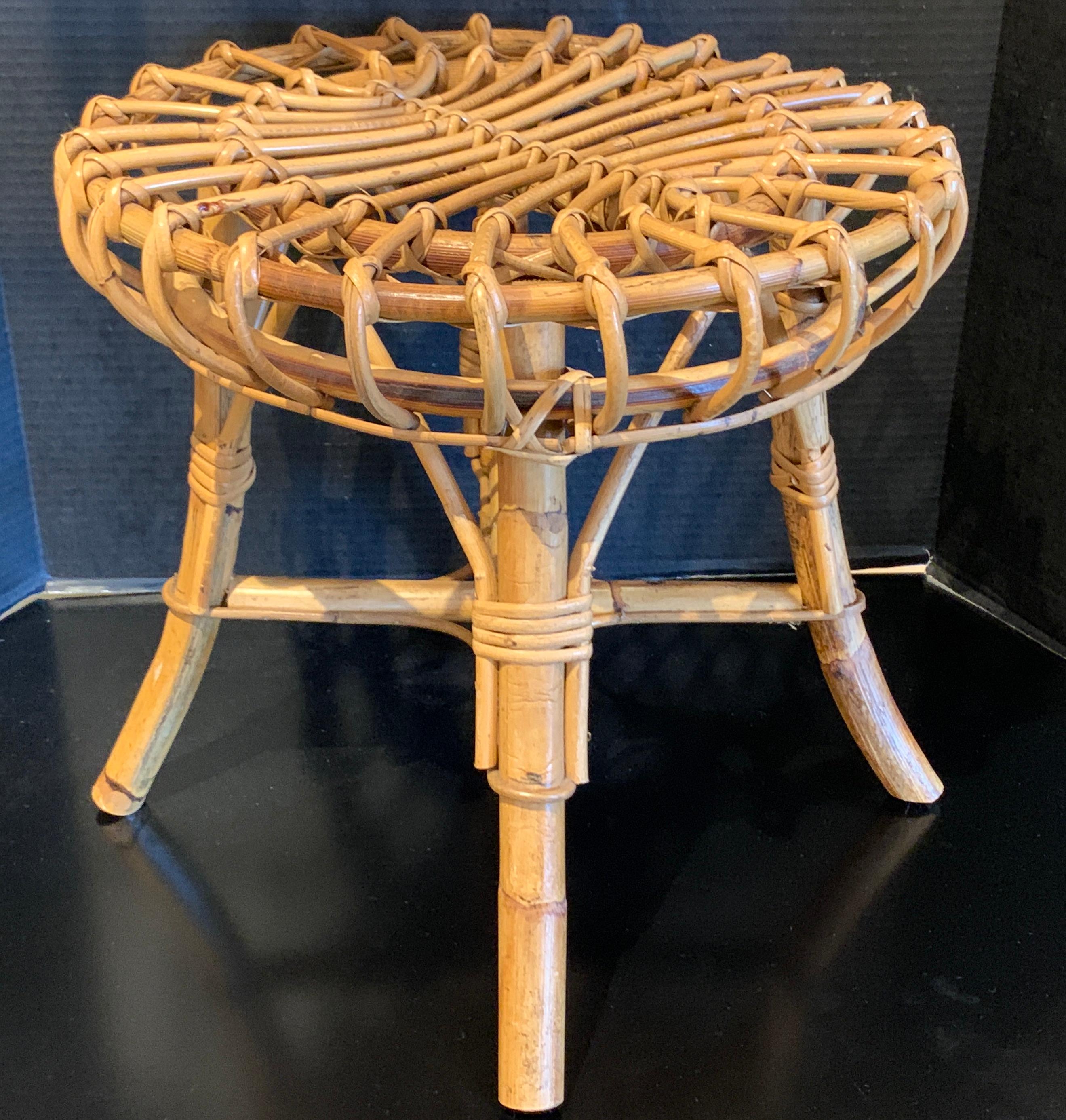 Midcentury rattan stool in the style of Franco Albini, a fine example in near mint condition.