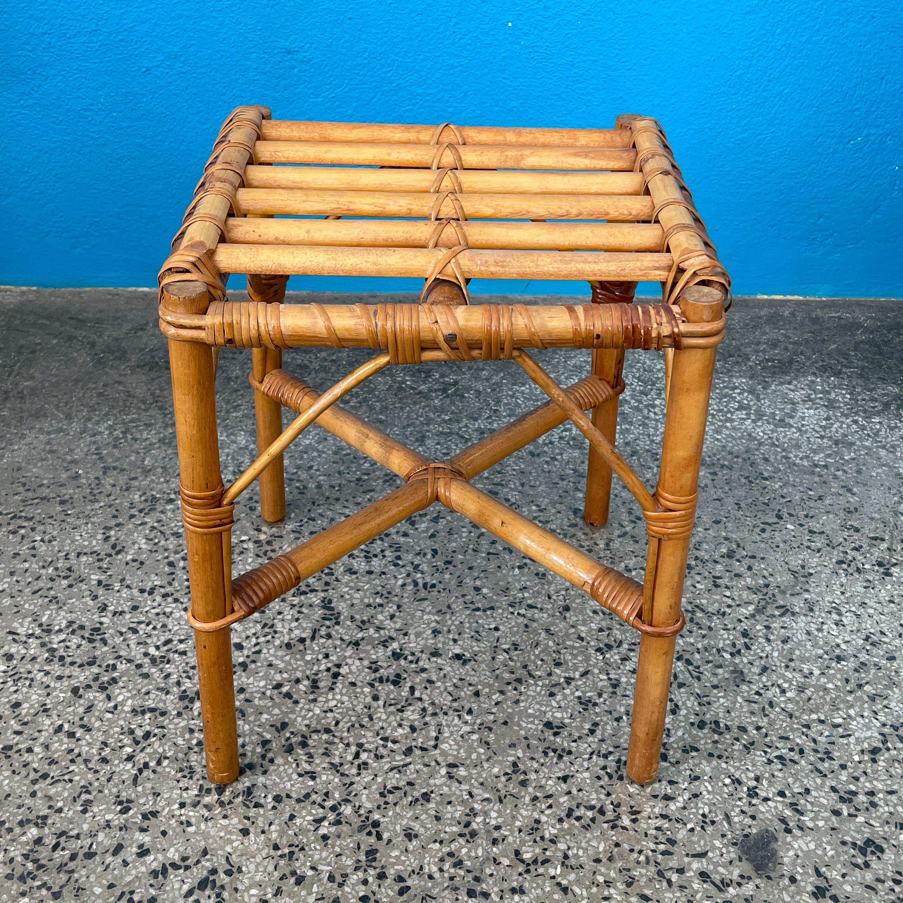 Stylish Vintage Rattan / Bamboo stool which can also be used as a side table or a flower table, for example.

- Height 45cm / 18.2in
- Width and length 37cm / 14.5in

