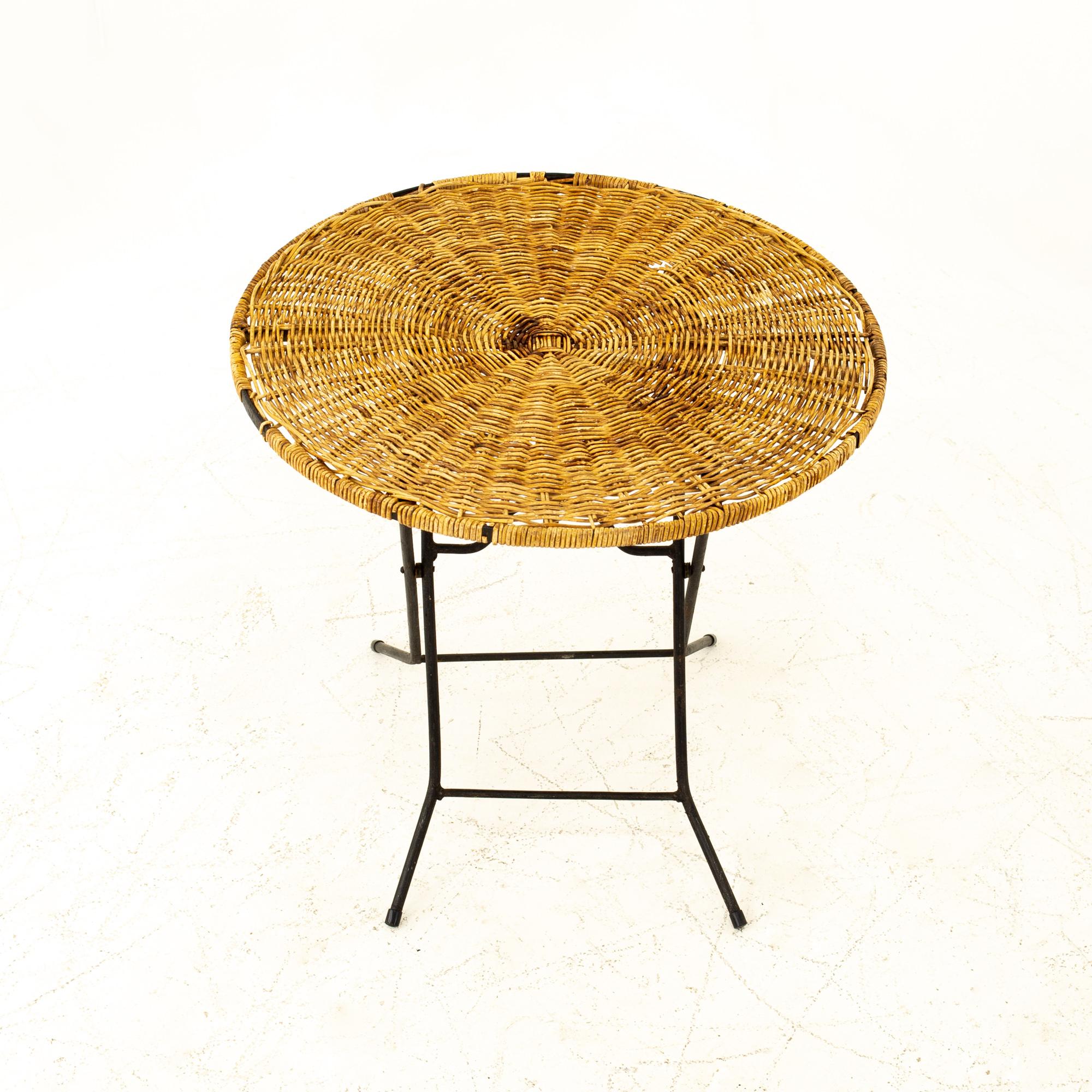 Mid century rattan top folding side end table
Table measures: 23.25 wide x 23.25 deep x 22.25 high

All pieces of furniture can be had in what we call restored vintage condition. That means the piece is restored upon purchase so it’s free of