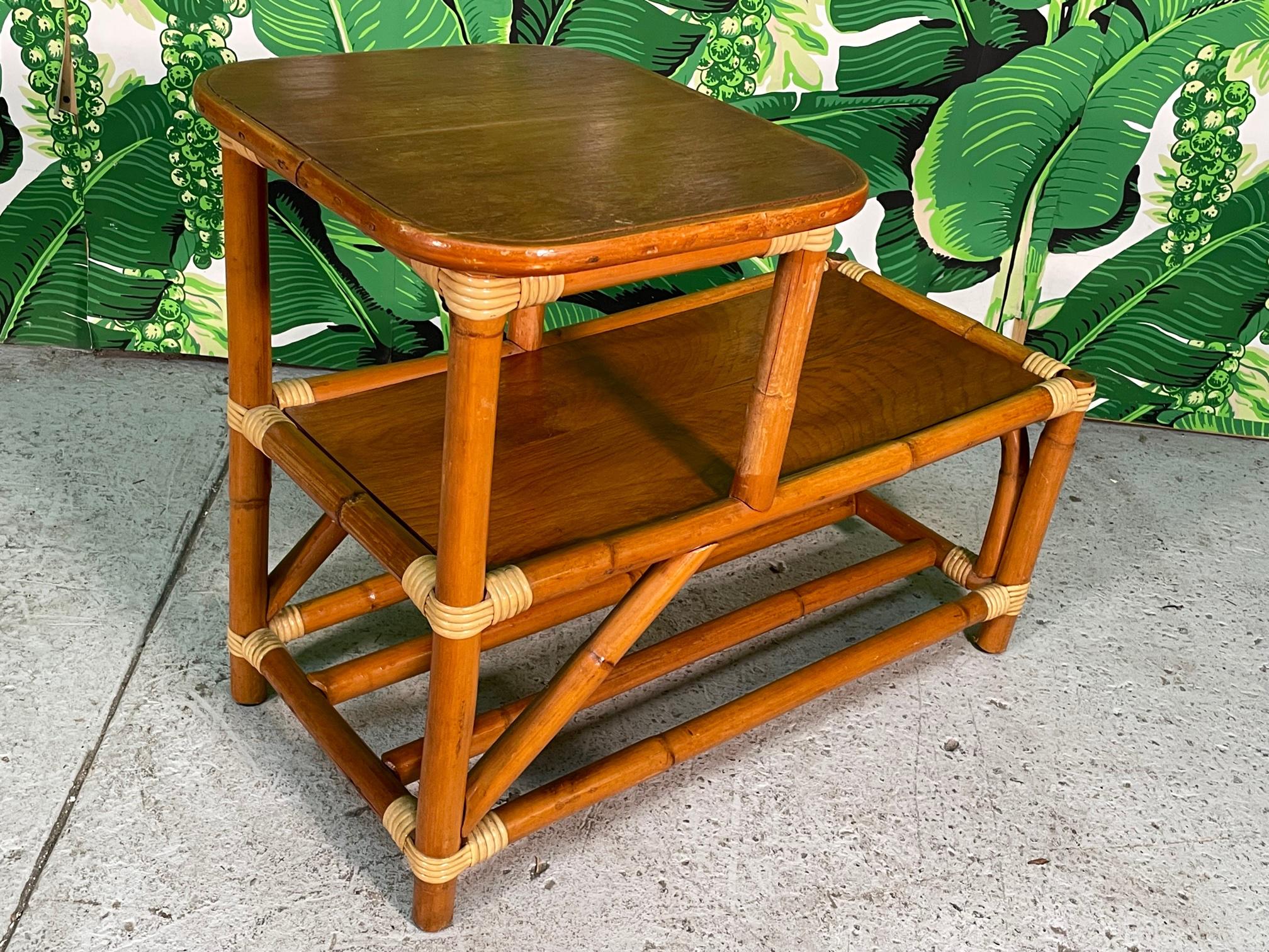 Midcentury Rattan Two-Tiered Side Table Features Mohagany Tops and Contrasting  In Good Condition For Sale In Jacksonville, FL