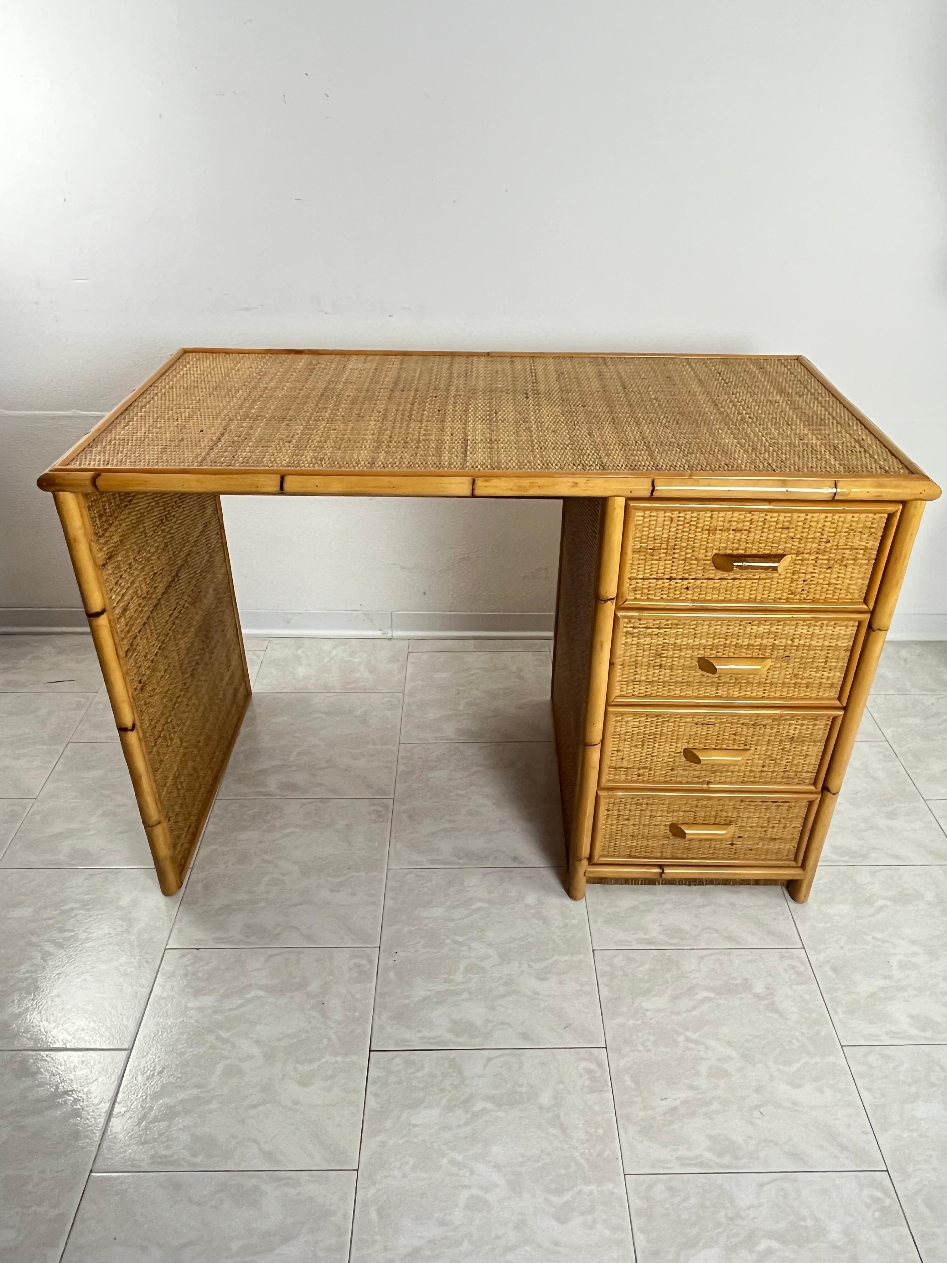 Mid-Century rattan wicker and bamboo desk attributed to Dal Vera 1960s
Complete and in good condition, it has four very spacious drawers.

Dal Vera Antonio e Figli (1884 – 1984) The factory, active from 1884 to 1984 in the Conegliano Veneto factory