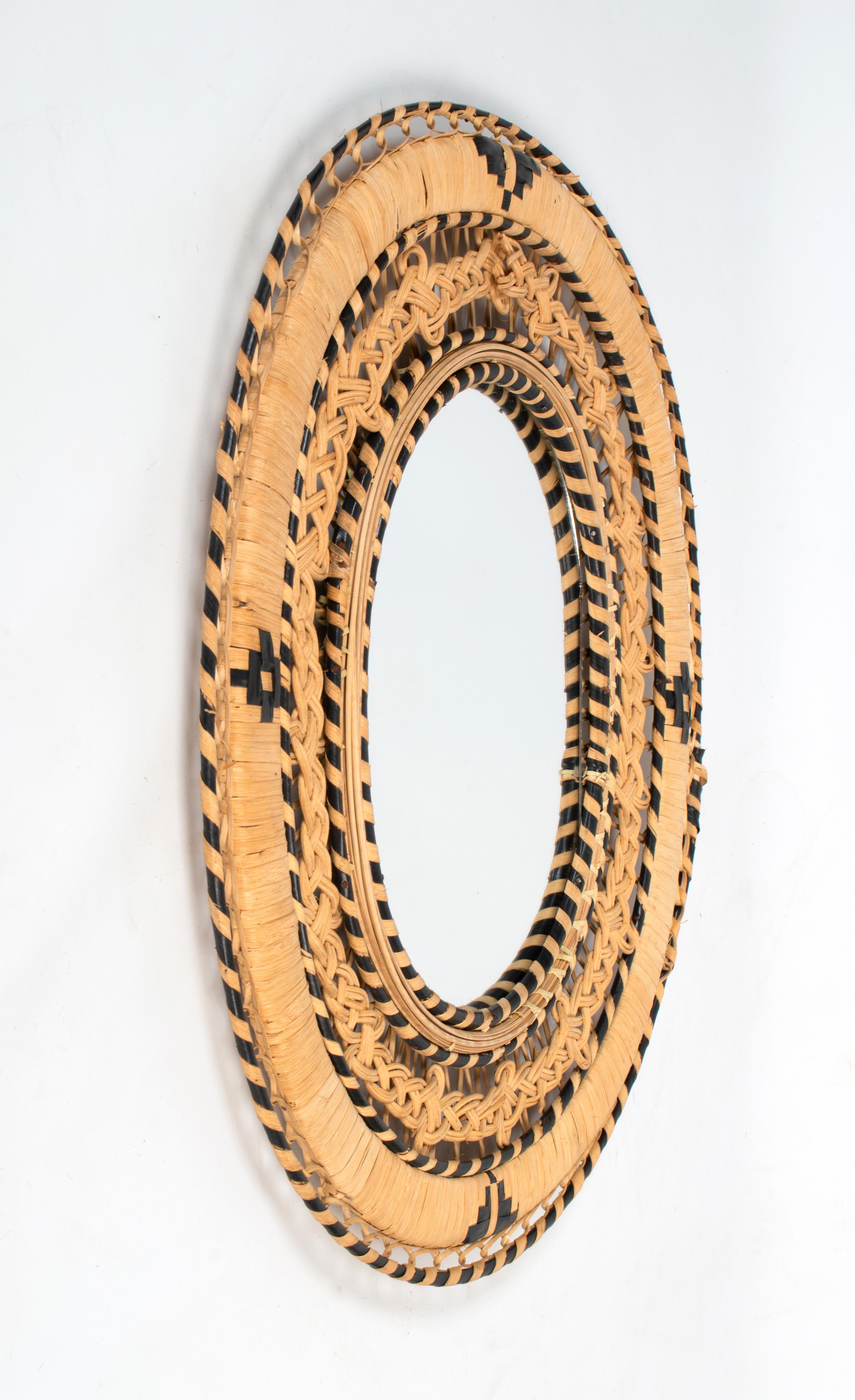 Mid Century Rattan Wicker Emmanuelle Peacock Oval Wall Mirror Spain, C.1970

Excellent condition commensurate of age.

