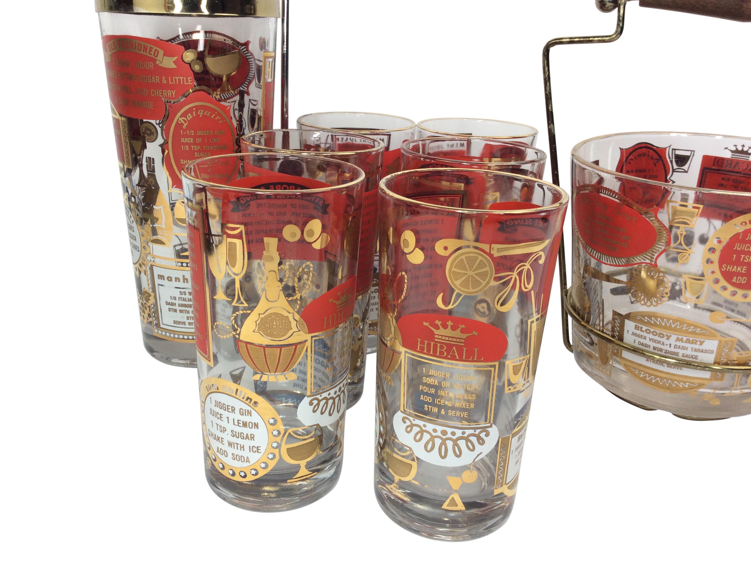 Mid-Century Glass Recipes Cocktail Set with ice bucket Jeannette Glass Co. In Original Gold Metal Carrier, Cocktail Shaker with stirrer and six Highball Glasses . Recipes are printed on white and red backgrounds with gold letters. The glasses