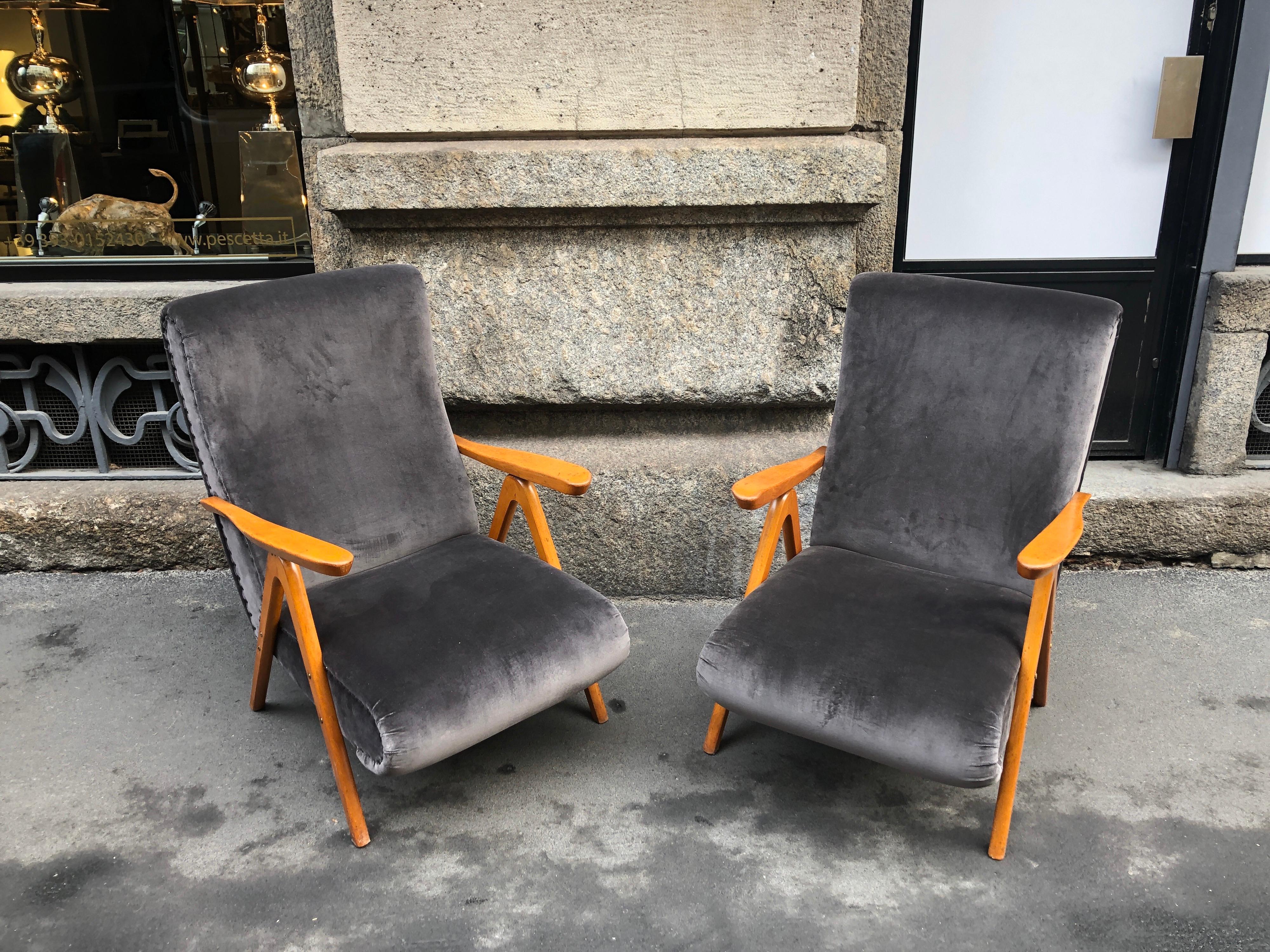Midcentury reclining grey pearl velvet armchairs, set of two. They can be reclined in three positions. They conditions are very good. New upholstery and paddings, wooden parts restored in conservative way, they show some minor wears coherent with