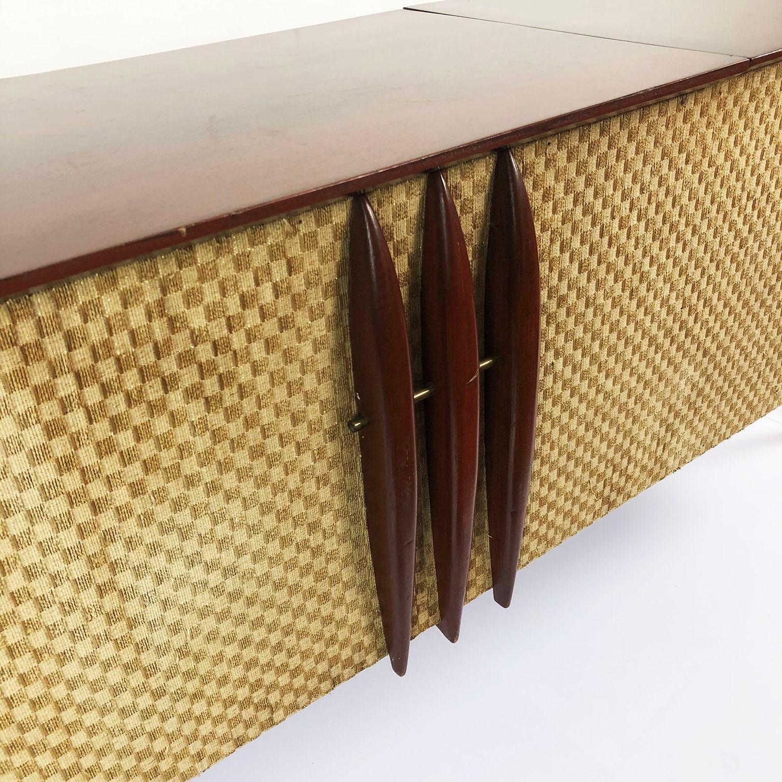 We offer this midcentury record player console with amazing design, the console works, circa 1950.