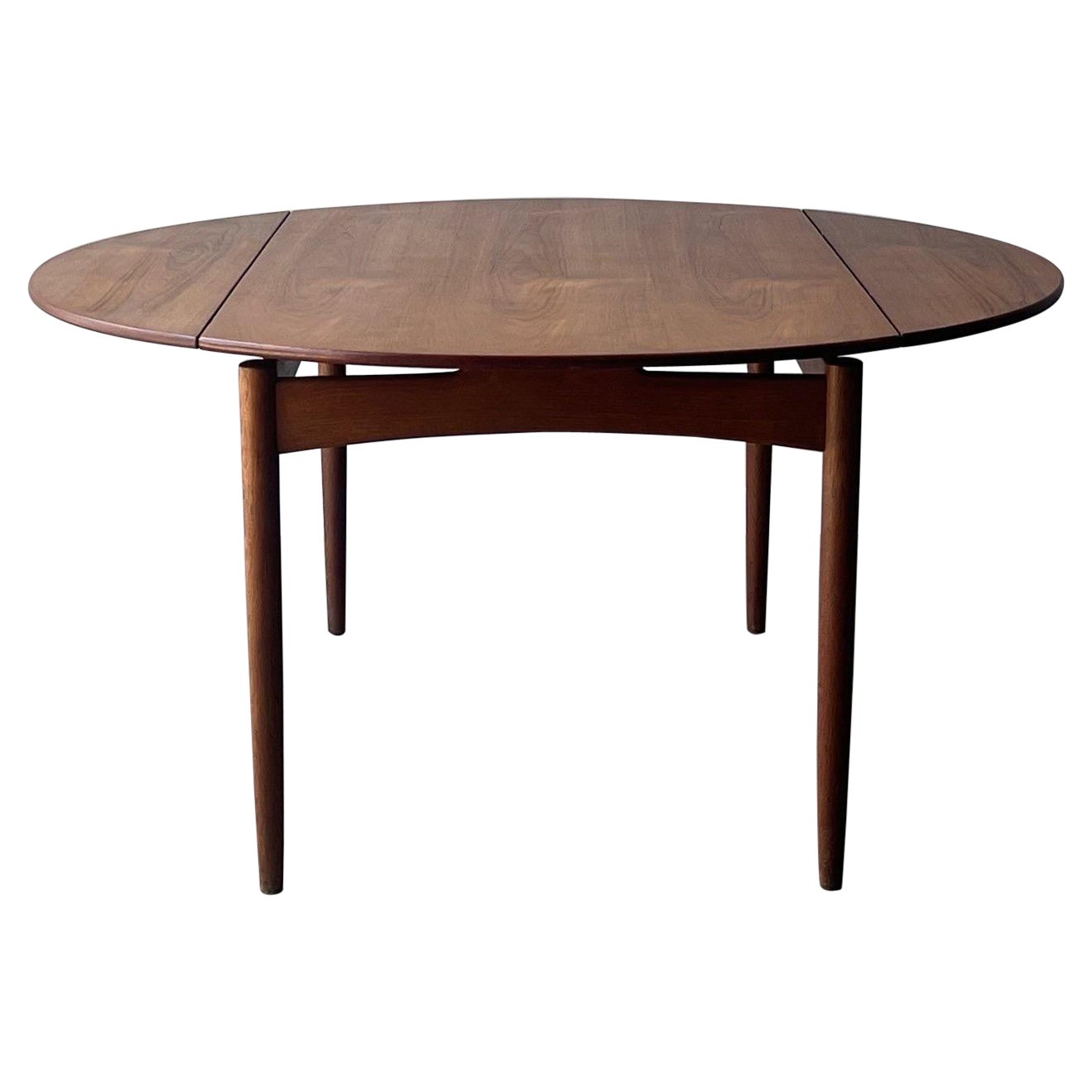 Mid-Century Rectangular to Circular Expanding Dining Table by Svend Madsen
