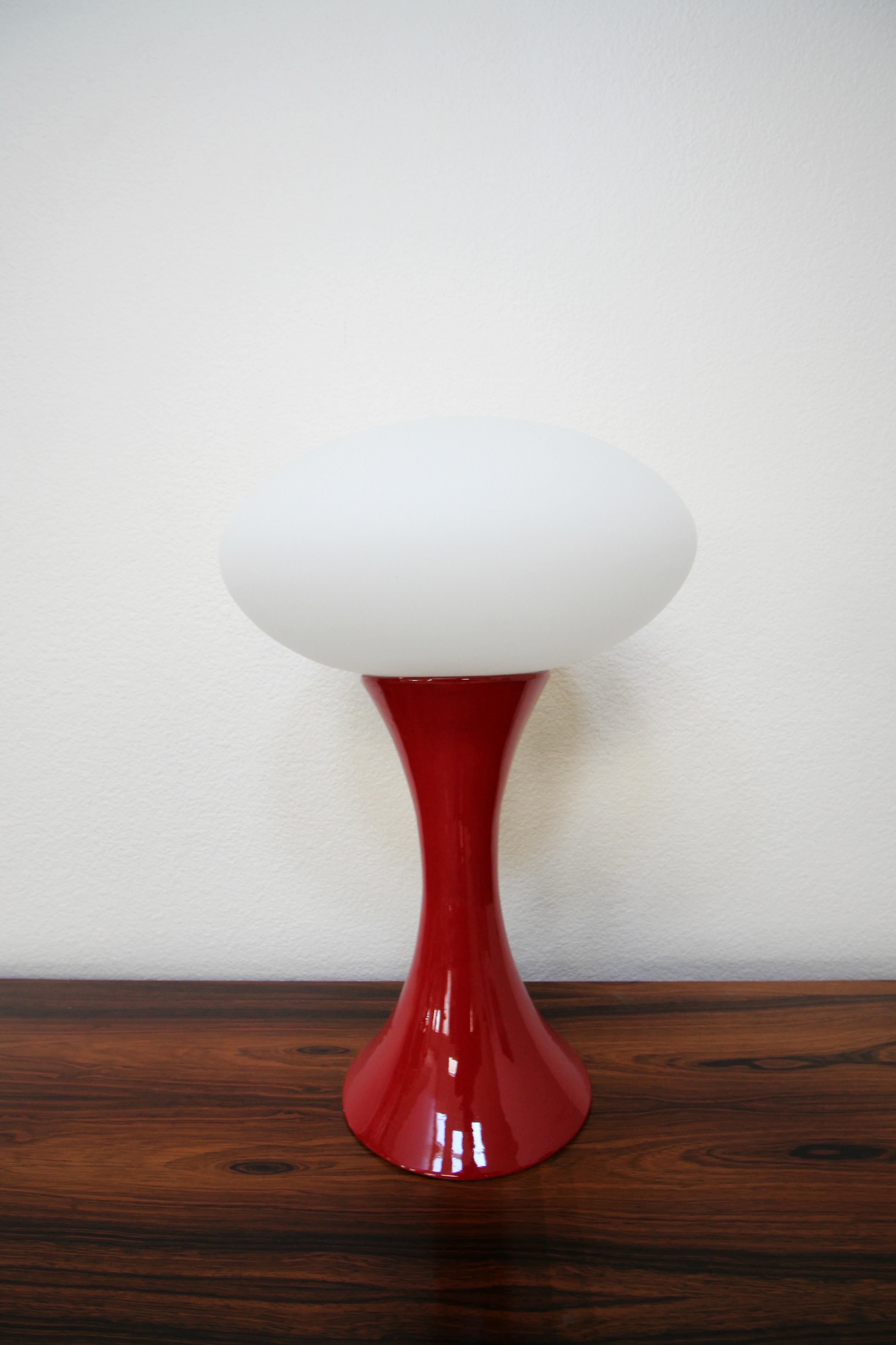 Gorgeous Italian ceramic and porcelain table lamp. Finished in a high gloss red and topped with a Classic Laurel Lamp Company style shade, this beauty is a real show stopper.

Dimensions: Overall: 20.25