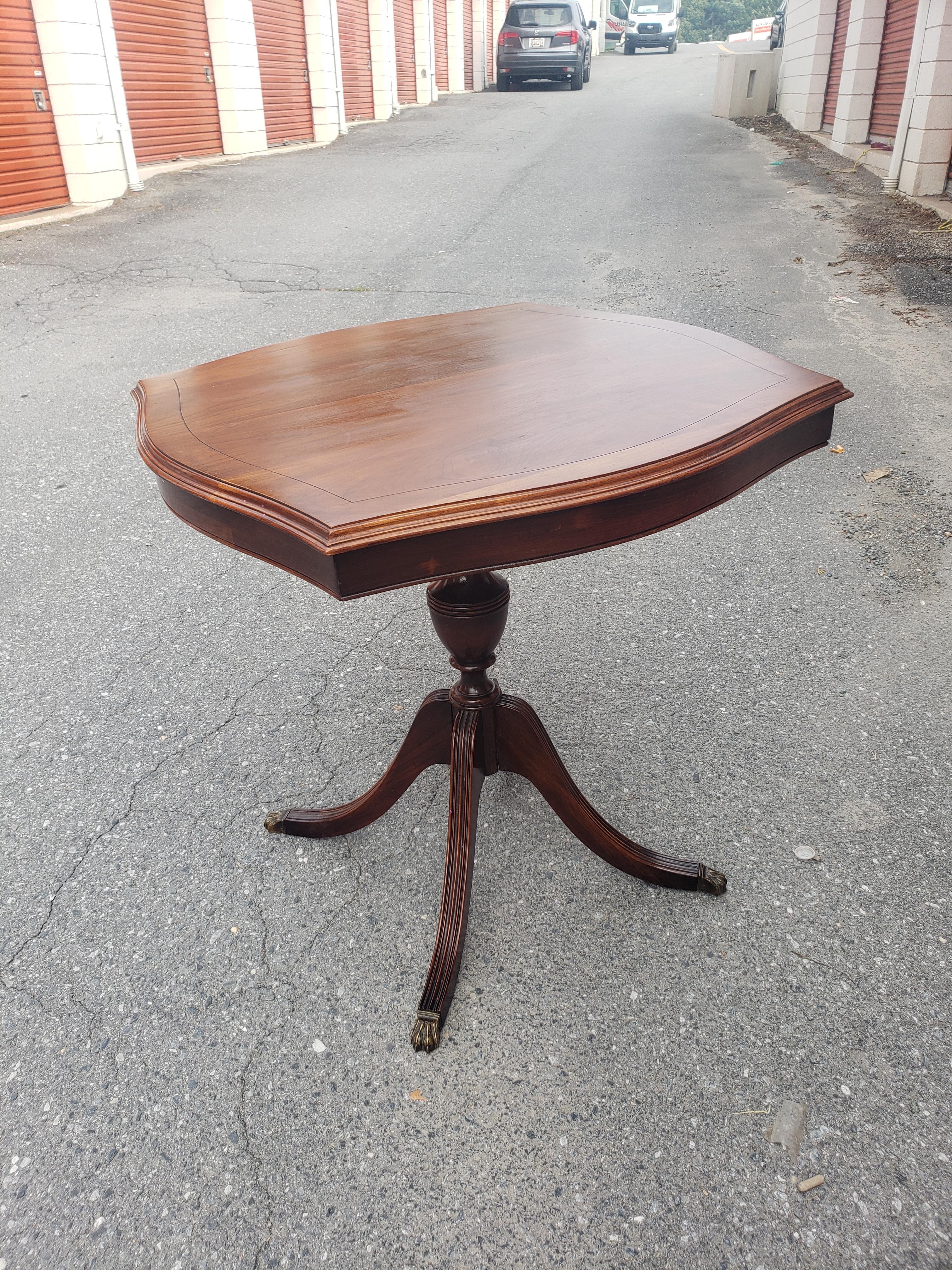 Mid-Century Refinished Solid Walnut Pedestal Quadpod Tea Table w Brass Paw Feet In Excellent Condition For Sale In Germantown, MD