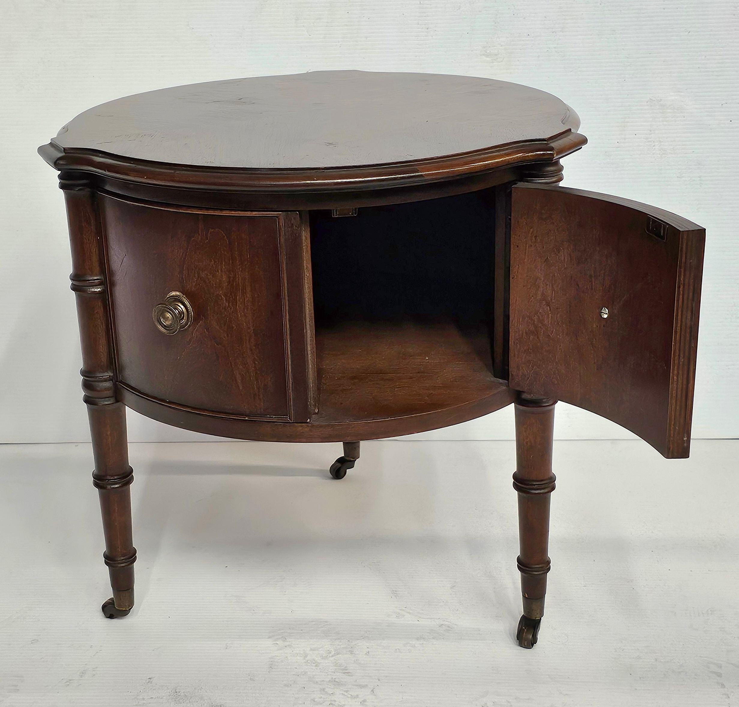 Mid-Century Regency Style Walnut Rolling Trifid Storage Drum Side  Table In Good Condition For Sale In Germantown, MD
