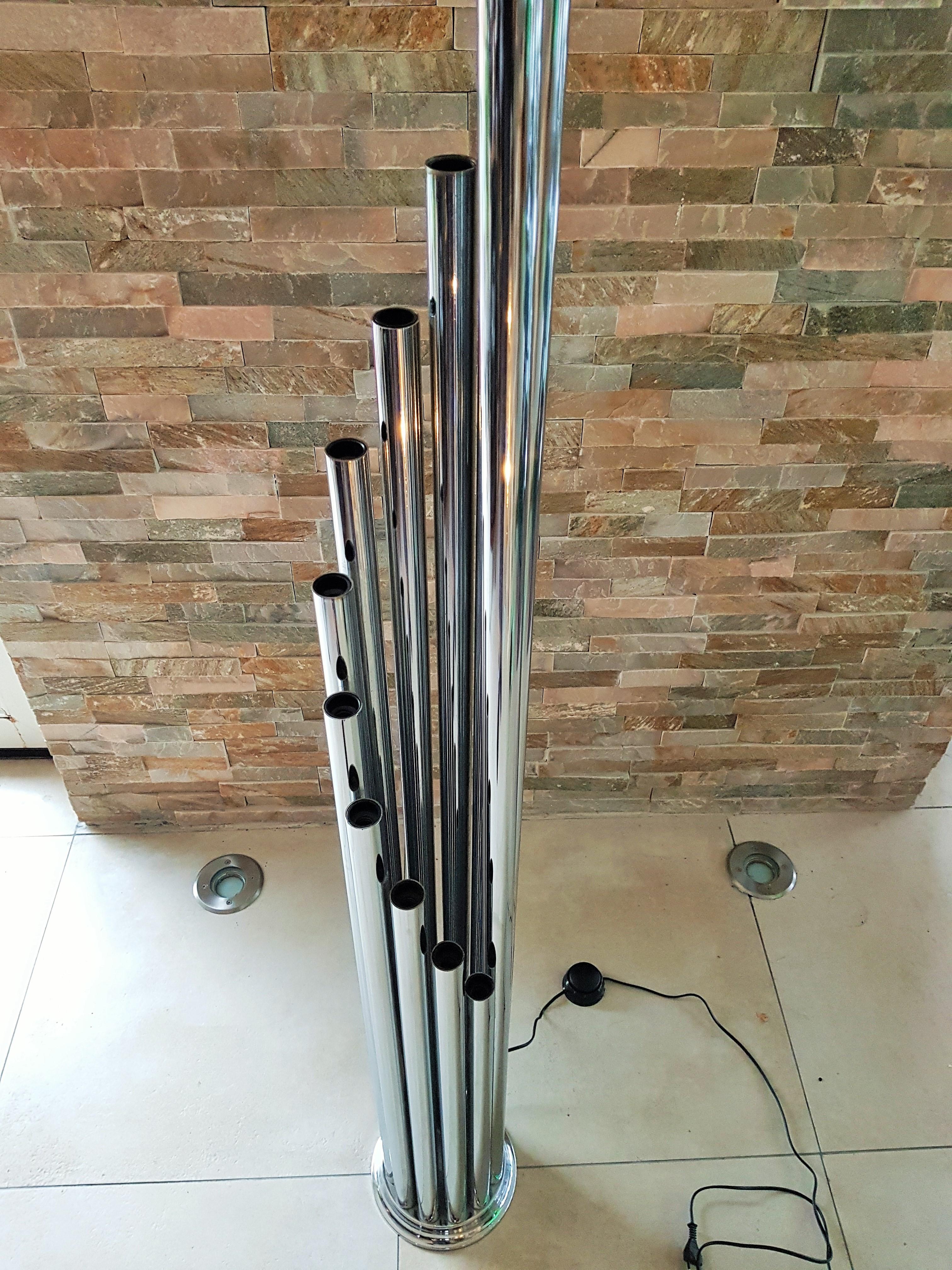 1960s Goffredo Reggiani floor lamp. Array of ascending tubular lights spiralling from a round plinth like organ pipes. Chrome in good condition. Fully rewired, all cables new. Footswitch.

 