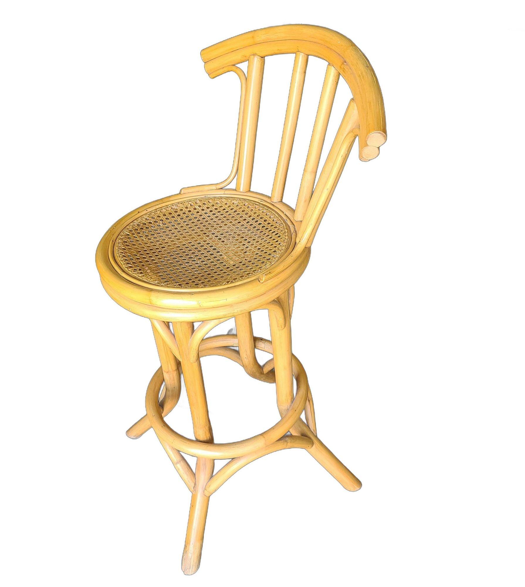 Rattan bar stool with woven wicker seats and 3 strand rattan pull legs. Stool comes with a full formed back rest complimented by arches connecting each leg.

Measures: Height- 38