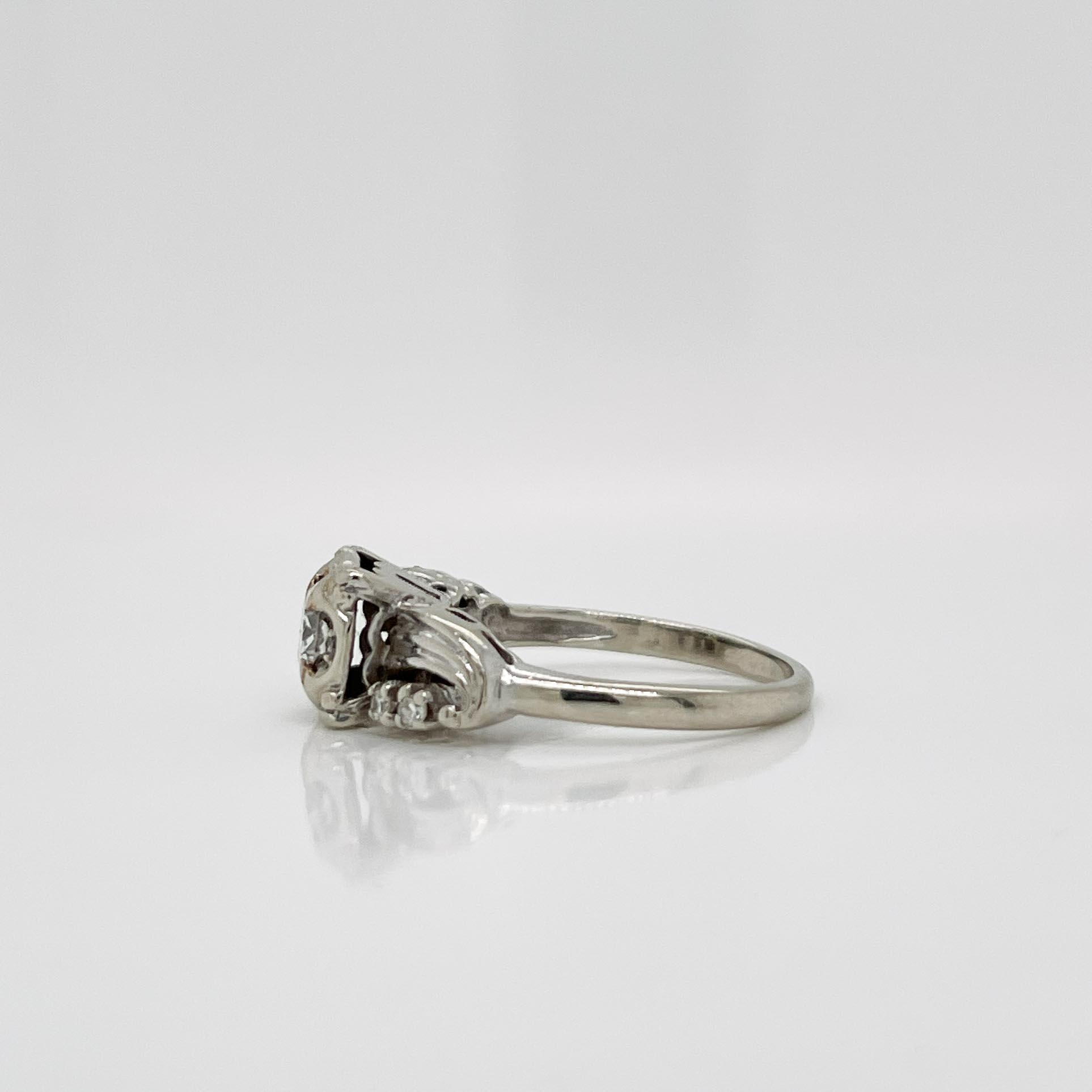mid century modern engagement rings