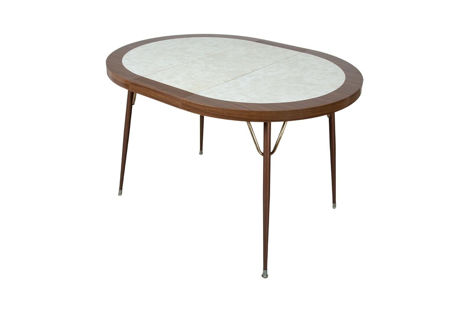 Mid-Century Retro Laminate Circular Metal Base Expandable Table In Fair Condition For Sale In Baltimore, MD