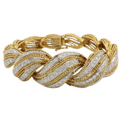 Pulsera tejida retro de mediados de siglo en oro amarillo y diamantes naturales