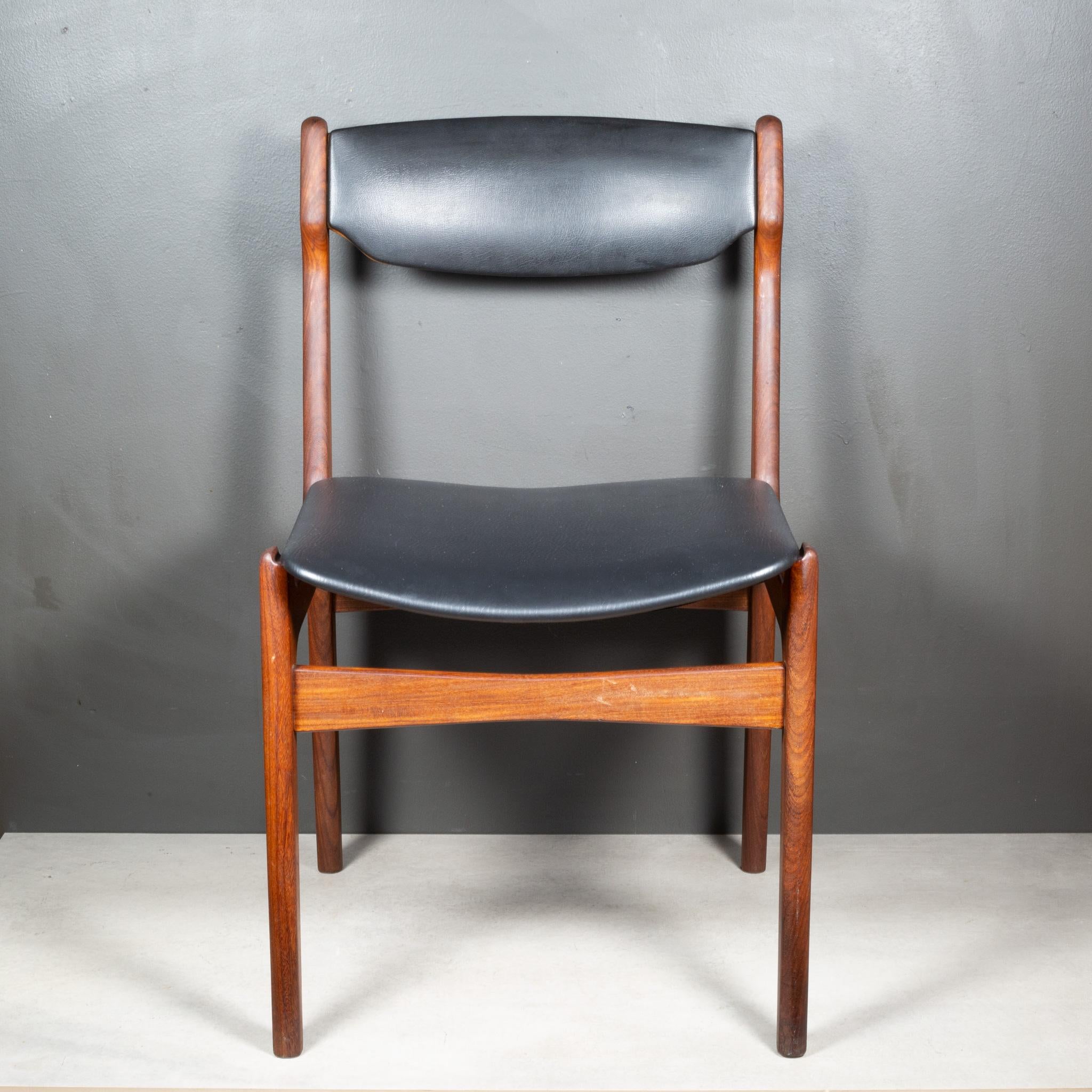ABOUT

A set of four dining chairs with two tone Teak frames. Darker frames and lighter backrest. Reupholstered in new black textured vinyl.

    CREATOR Attributed to Erik Buch, Denmark.
    DATE OF MANUFACTURE c.1960. 
    MATERIALS & TECHNIQUES
