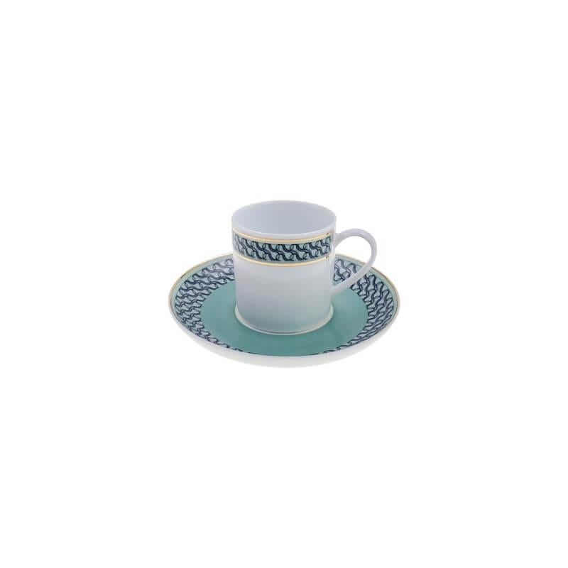 a refined collection of limoges porcelain that is inspired by the mid century architecture in the 60s. each piece is highlighted with a decal pattern garnished in two shades of mineral blue and 24k gold highlight. its classic composition shall