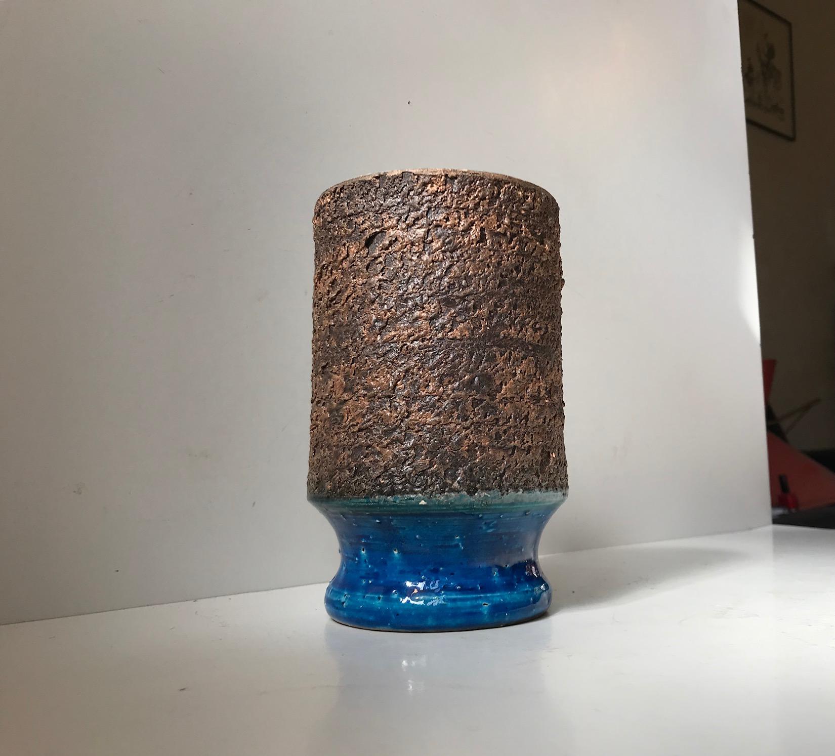 Aldo Londi designed this partially exposed stoneware vase with the characteristic Rimini blue glaze. It was manufactured in Italy by Bitossi during the 1960s.