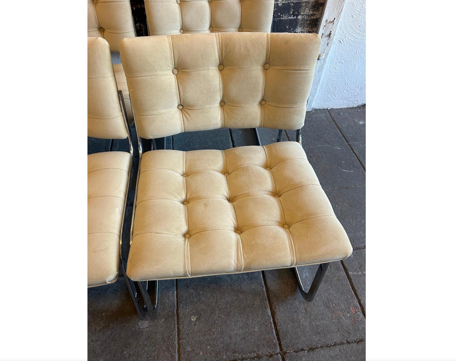 A unique set of (6) RH-304 Suede/ Leather chairs. designed by Robert Haussmann and manufactured by Stendig De Sede. This set was made circa 1960. these chairs are upholstered in Light Tan Suede / leather. The rounded flat bar tube frames are made of