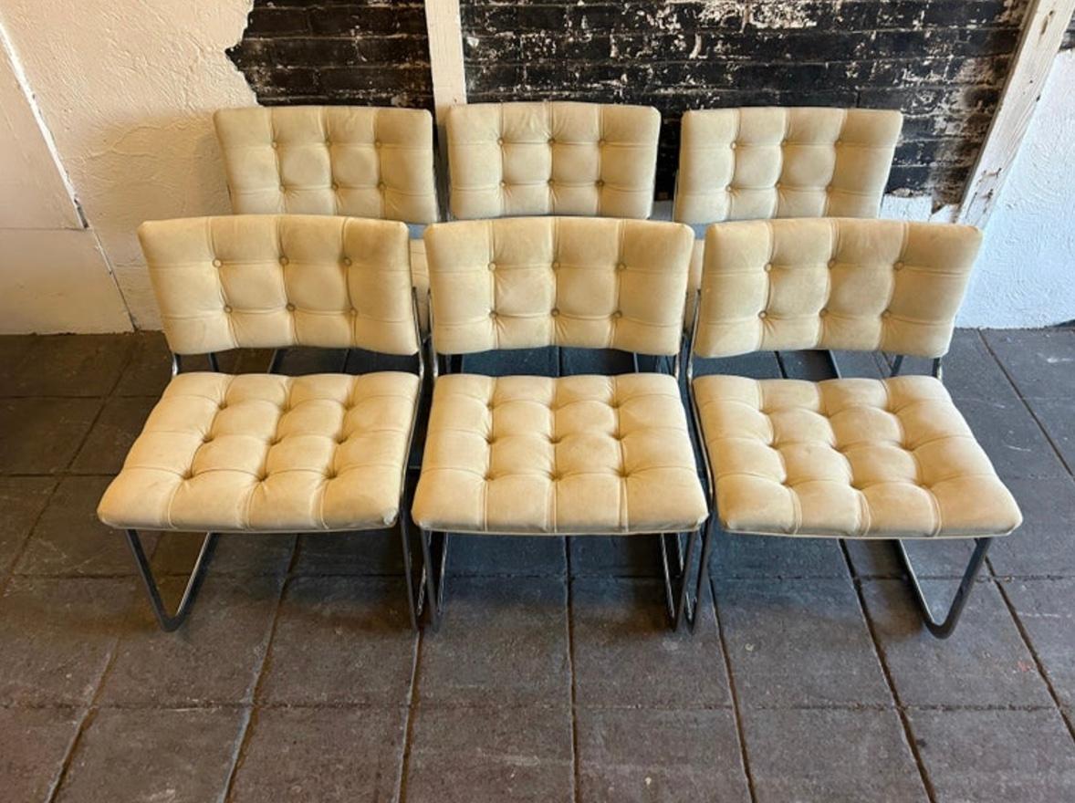 A unique set of (8) RH-304 or 'Polaris' Suede/ Leather chairs. designed by Robert Haussmann and manufactured by Stendig De Sede. This set was made circa 1960. these chairs are upholstered in Light Tan Suede / leather. The rounded flat bar tube