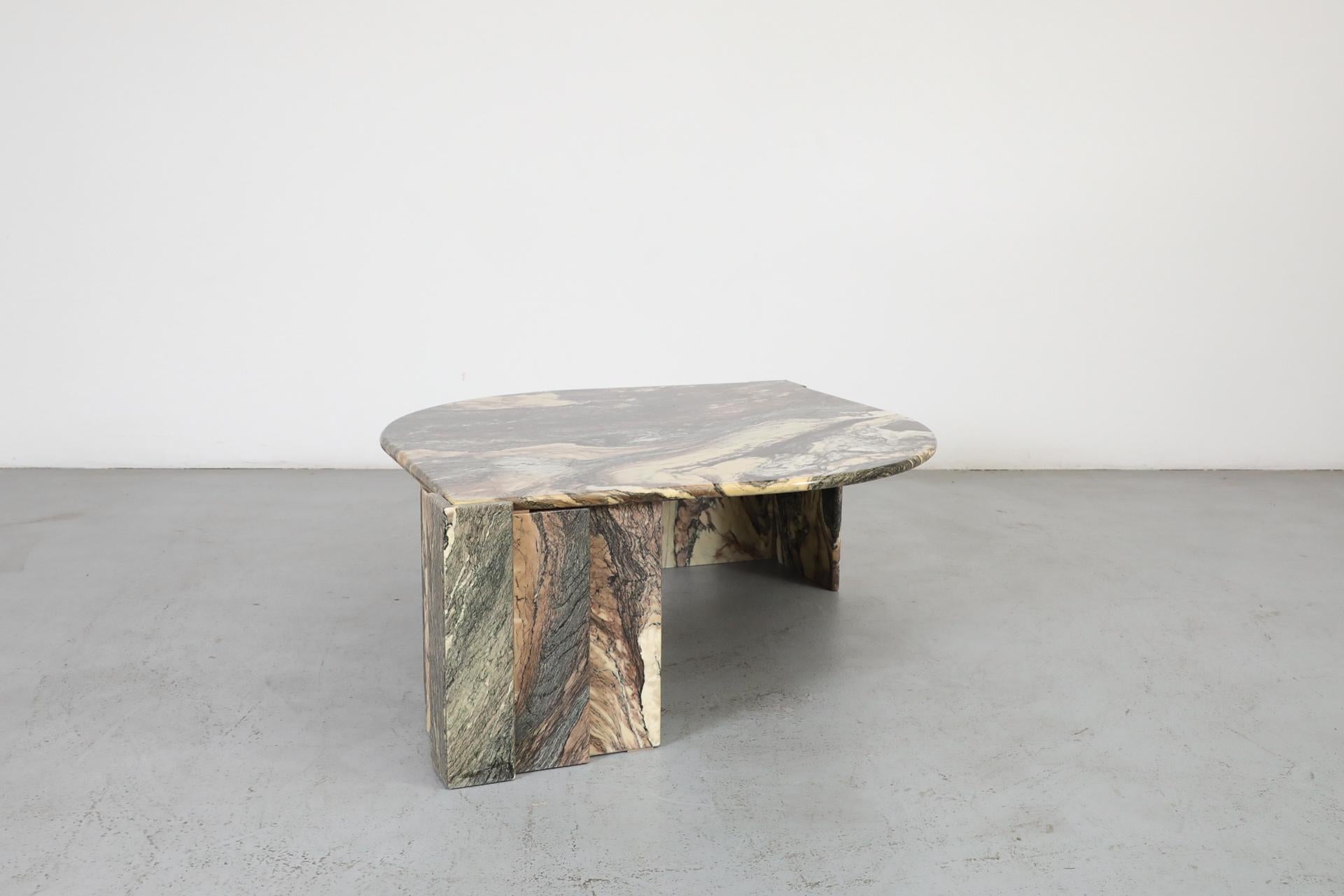 Mid-Century Roche Bobois Attributed Cat’s Eye Solid Marble Coffee Table In Good Condition In Los Angeles, CA