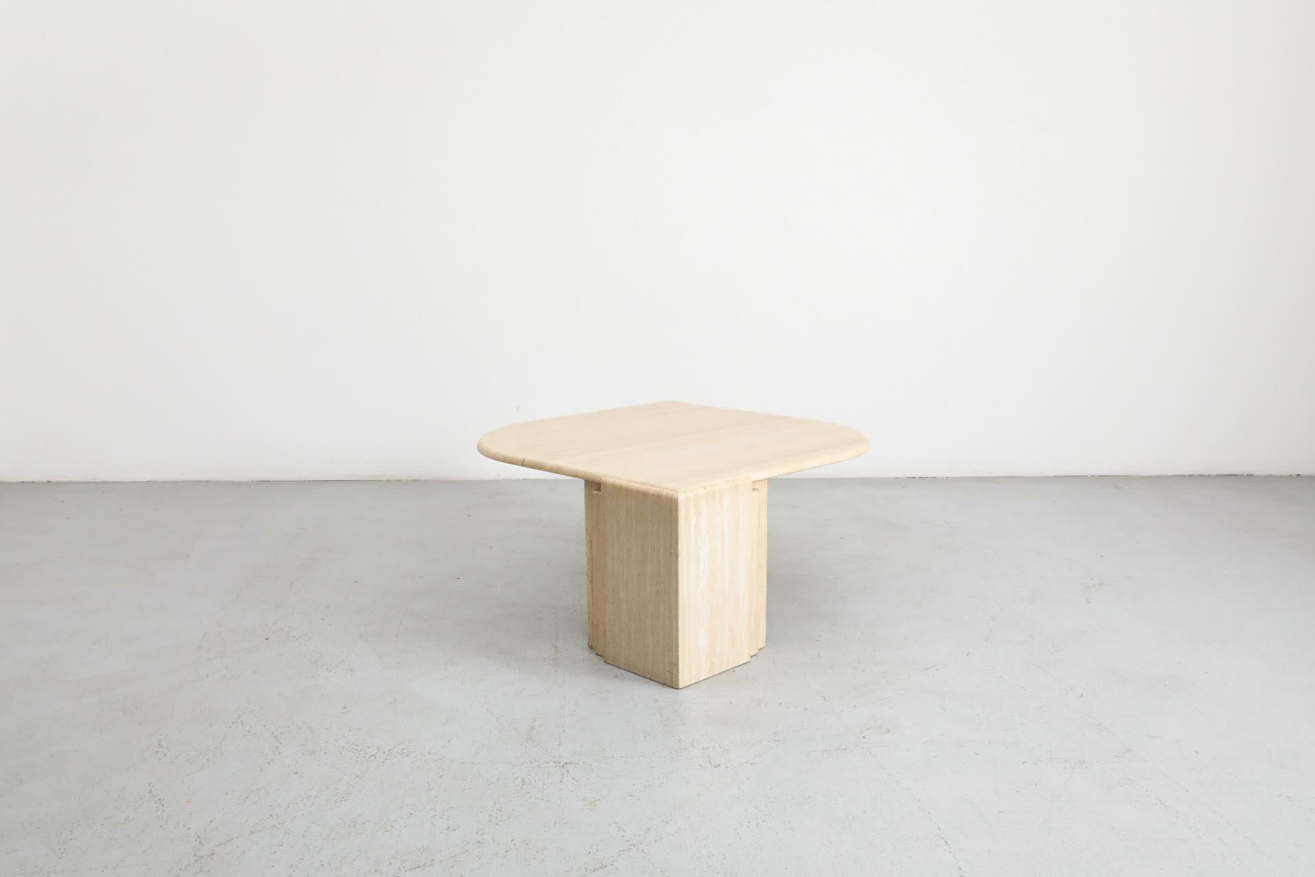 Mid-Century Roche Bobois Attributed Cat’s Eye Solid Travertine Coffee Table In Good Condition In Los Angeles, CA