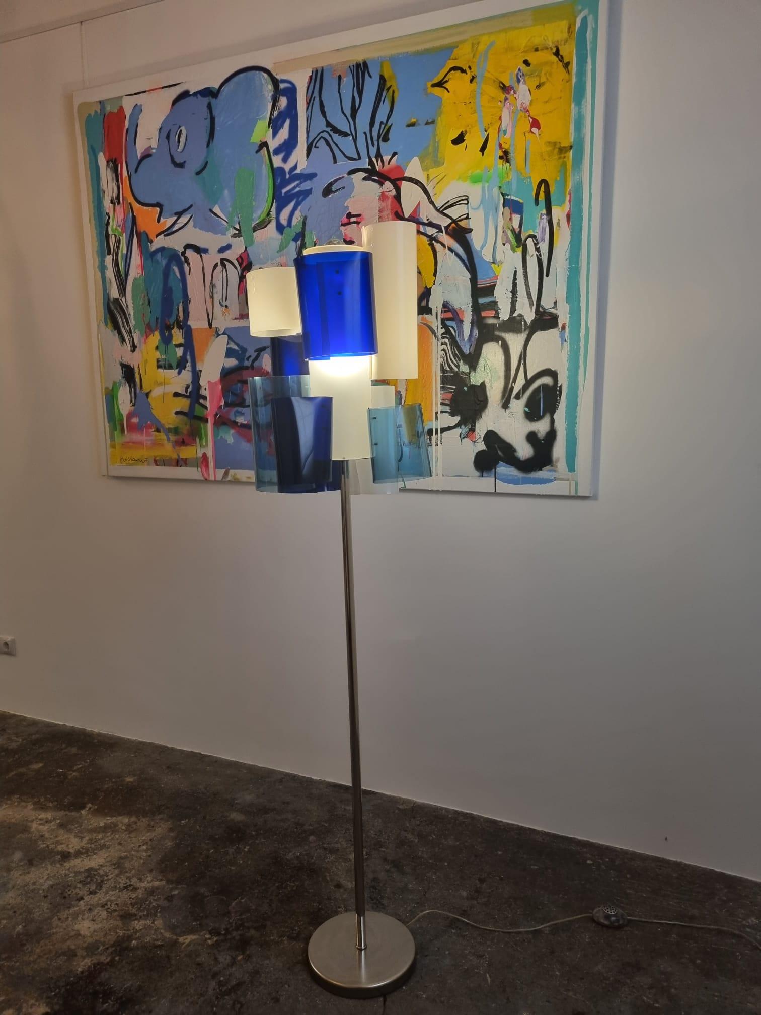 Vintage steel floor lamp by Roche Bobois from France in the 1970s, polymethyl colorful shades, all in very good condition. 

The dimensions vary according to the height regulation of the lamp: Height: 190, cm Diameter: 40, cm