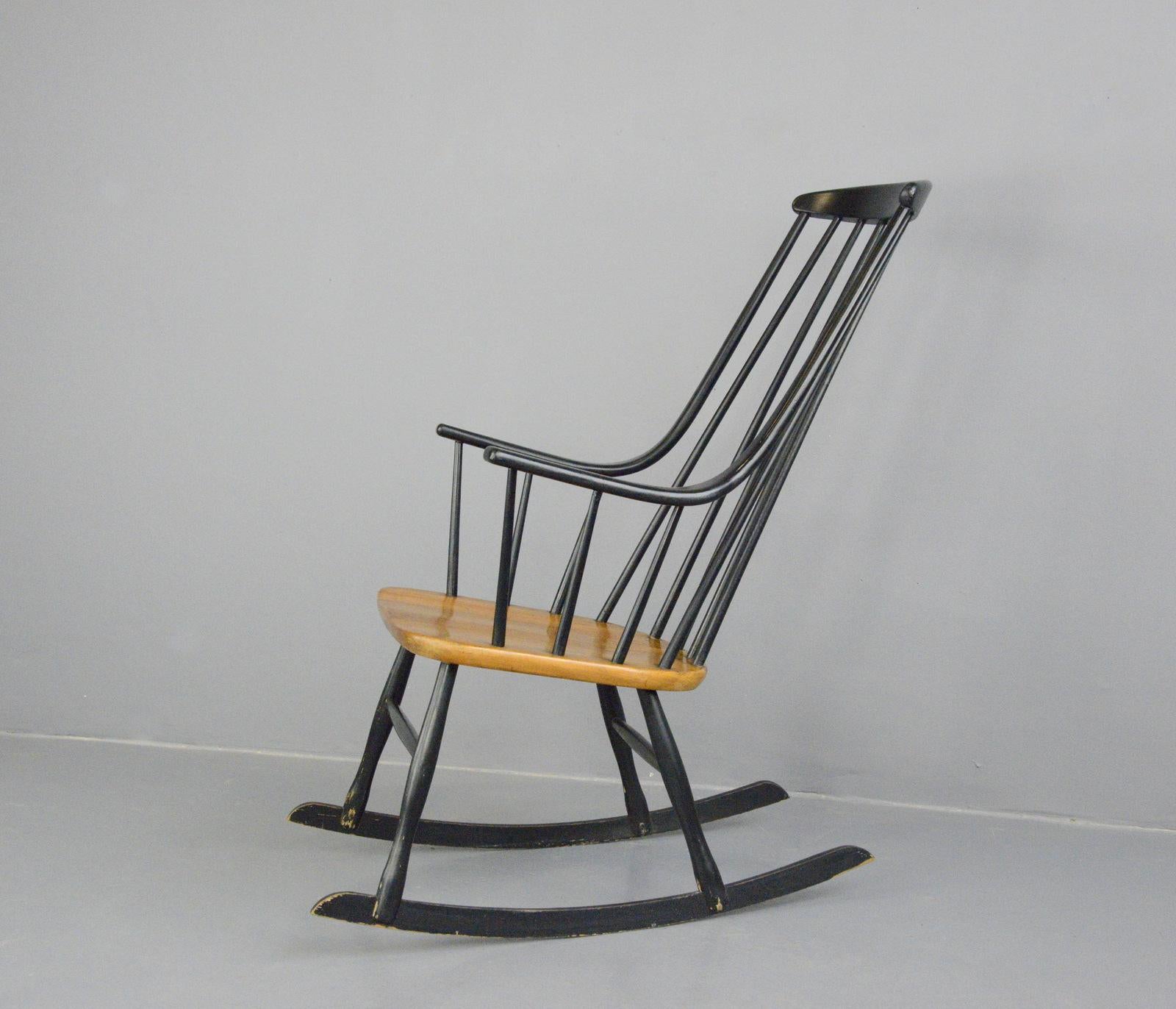 Midcentury rocking chair by Ilmari Tapiovaara

- Solid beech seat and frame
- By Ilmari Tapiovaara
- Finnish, 1960s
- Measures: 56cm wide x 72cm deep x 106cm tall
- 47cm seat height

Condition report

All joints have been glued and the