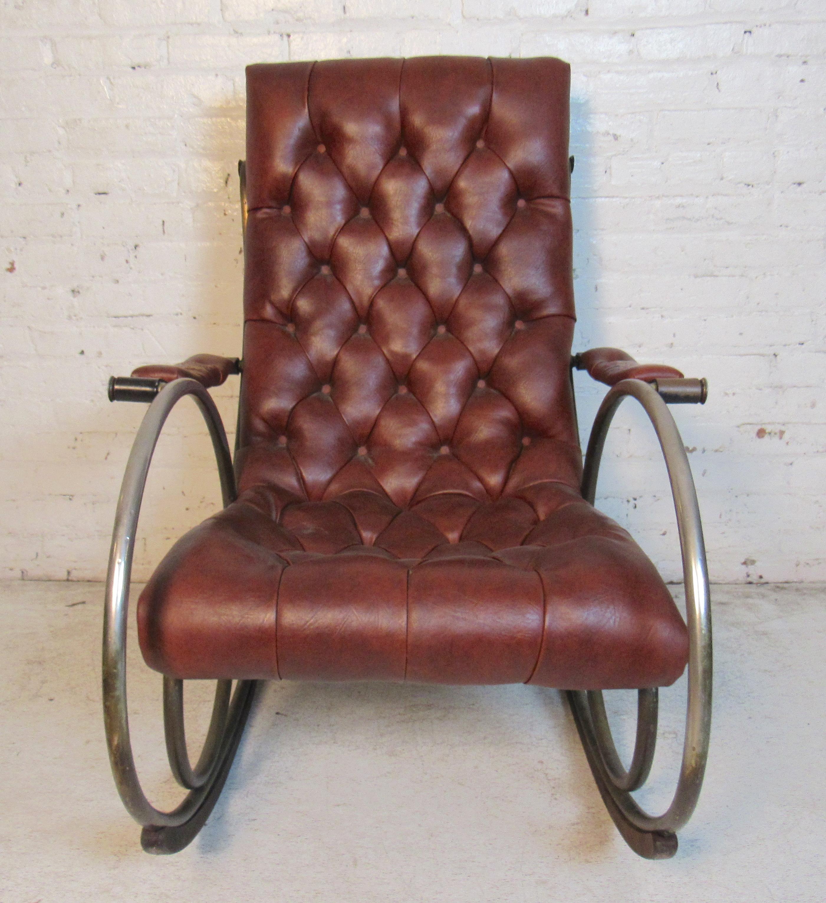 Beautifully designed sculptural rocker by Lee Woodard, with tufted leather body and brass railing.
(Please confirm item location - NY or NJ - with dealer).
 