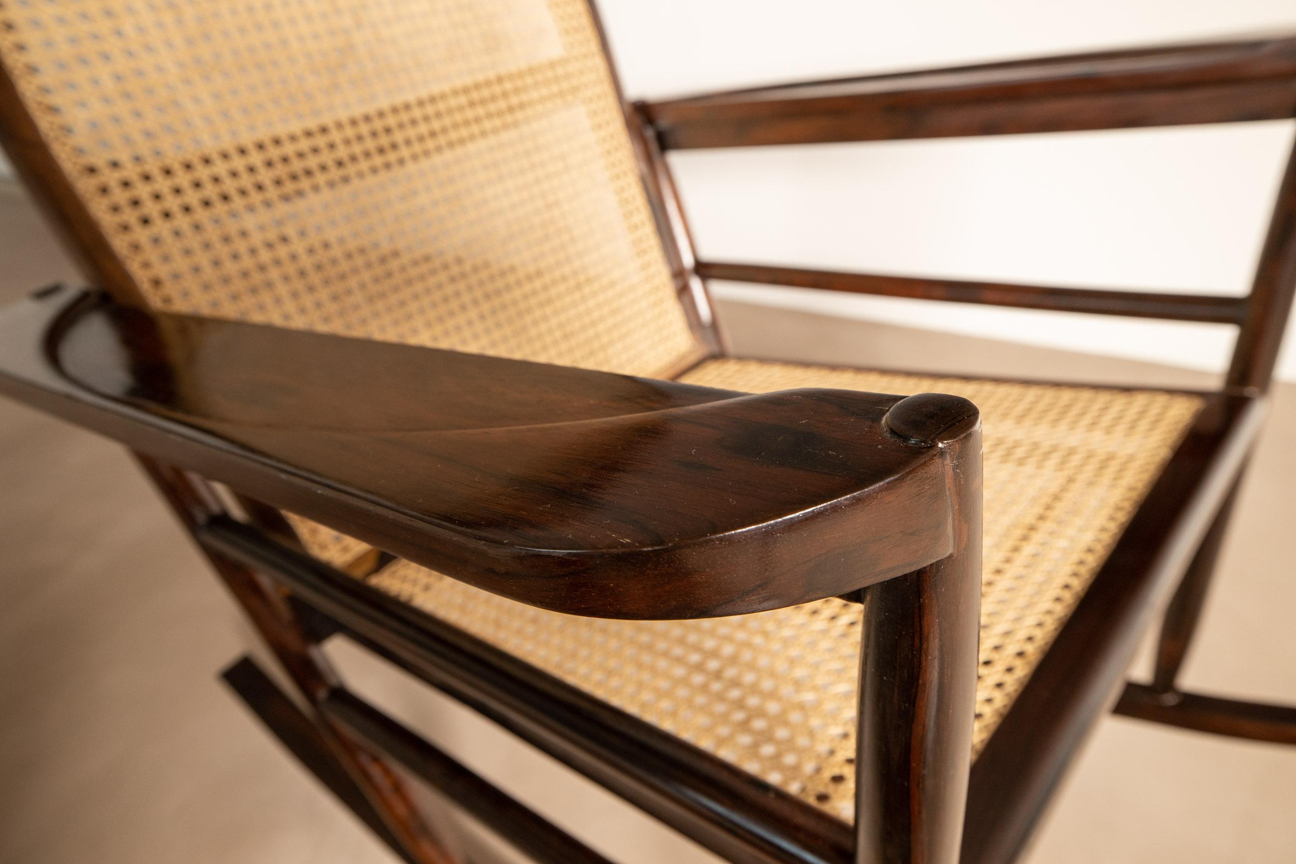 One of the first and important pieces in the Tenreiro production. Jacaranda structure, seat and back with cane.

Joaquim Tenreiro was among leading furniture designers and visual artists in modernist Brazilian furniture making in the mid-20th