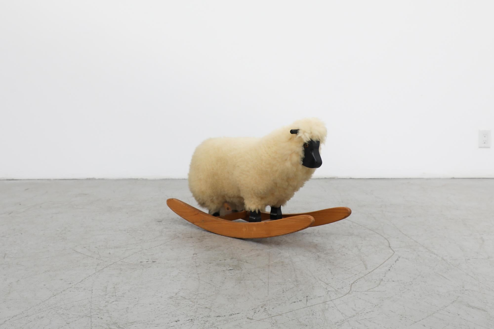 German Mid-Century Rocking Sheep w/ Real Sheepskin, Black Painted and Natural Wood For Sale