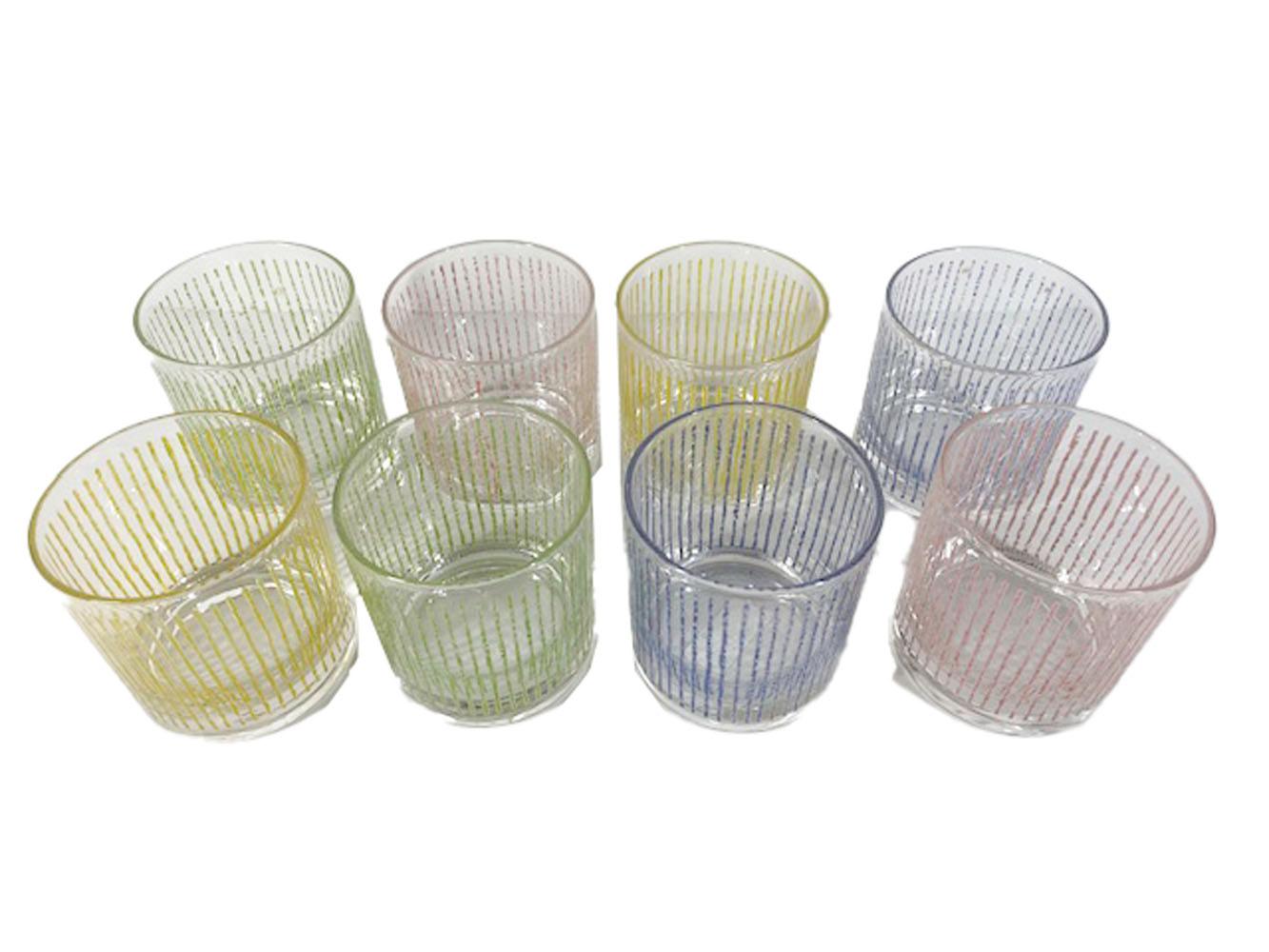 Eight mid-century modern rocks glasses by Federal Glass Co / two each of four colors having raised translucent vertical lines in red, green, yellow and blue.
