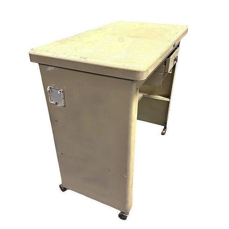 Original 1950s Cole Steel specialty rolling tanker task Desk made from powder-coated durable sheet steel, featuring a sleek, minimalist design.

Cole Stee Renowned for its sturdy construction and timeless appeal, this desk combines functionality