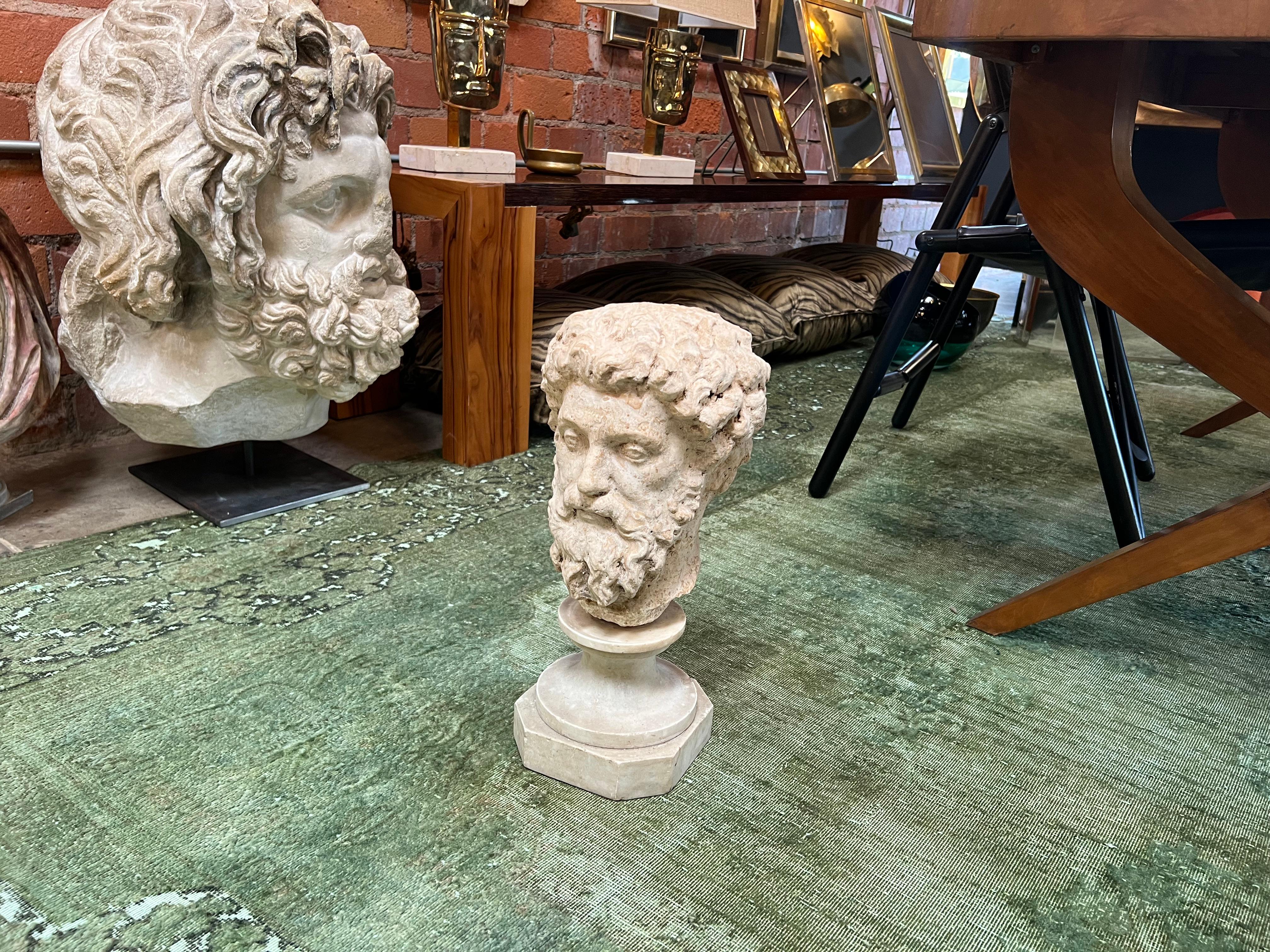 The Mid Century Roman Marcus Aurelius Head Sculpture from the 1950s is a striking artistic representation of the ancient Roman emperor's likeness. Crafted in the iconic style of the mid-20th century, it captures the essence of both historical and
