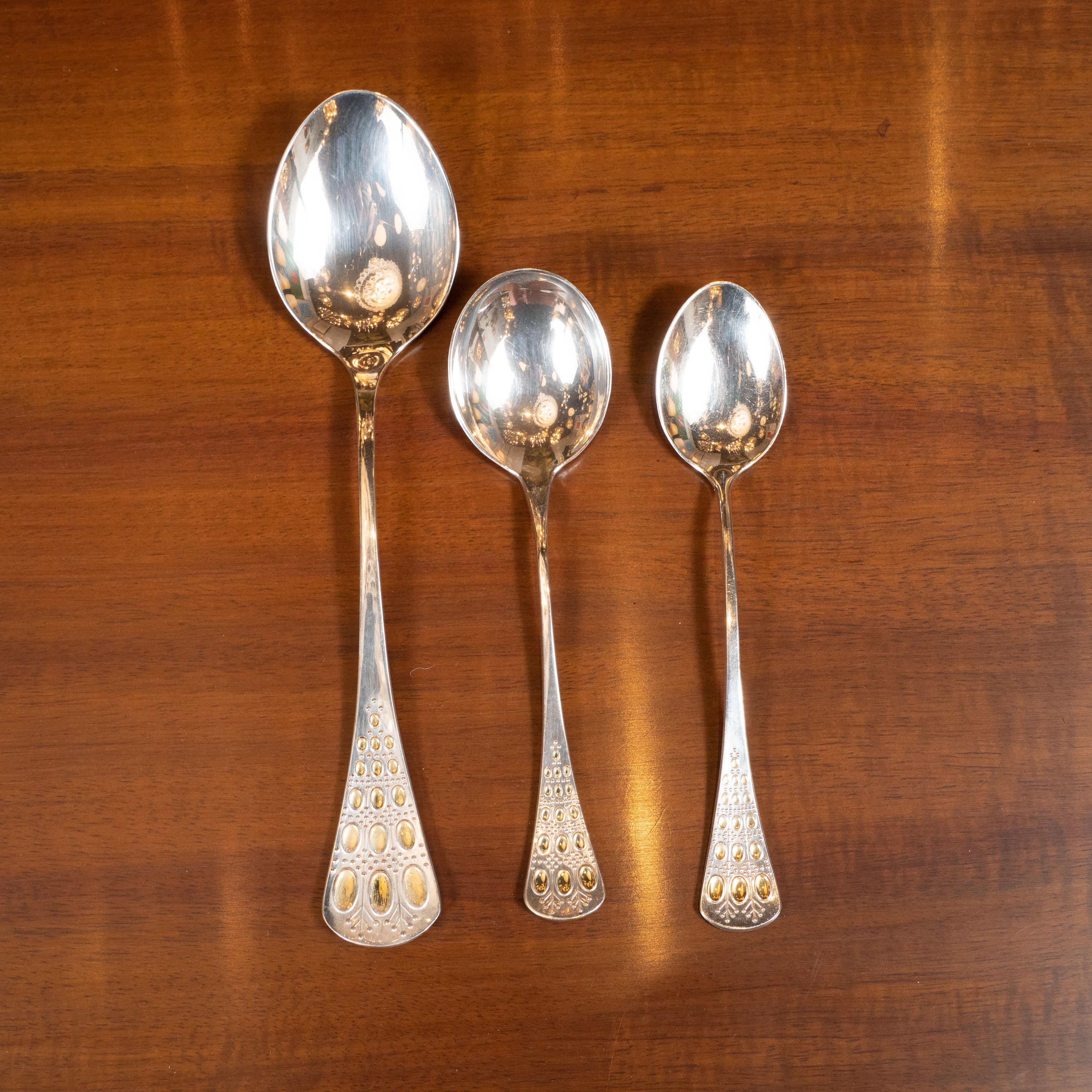 This sterling silver flatware service for eight was designed by the Bjørn Wiinbald for Rosenthal in 1962. Wiinbald began his career in Denmark as a ceramicist and quickly became well-known for his brightly colored work, which often features