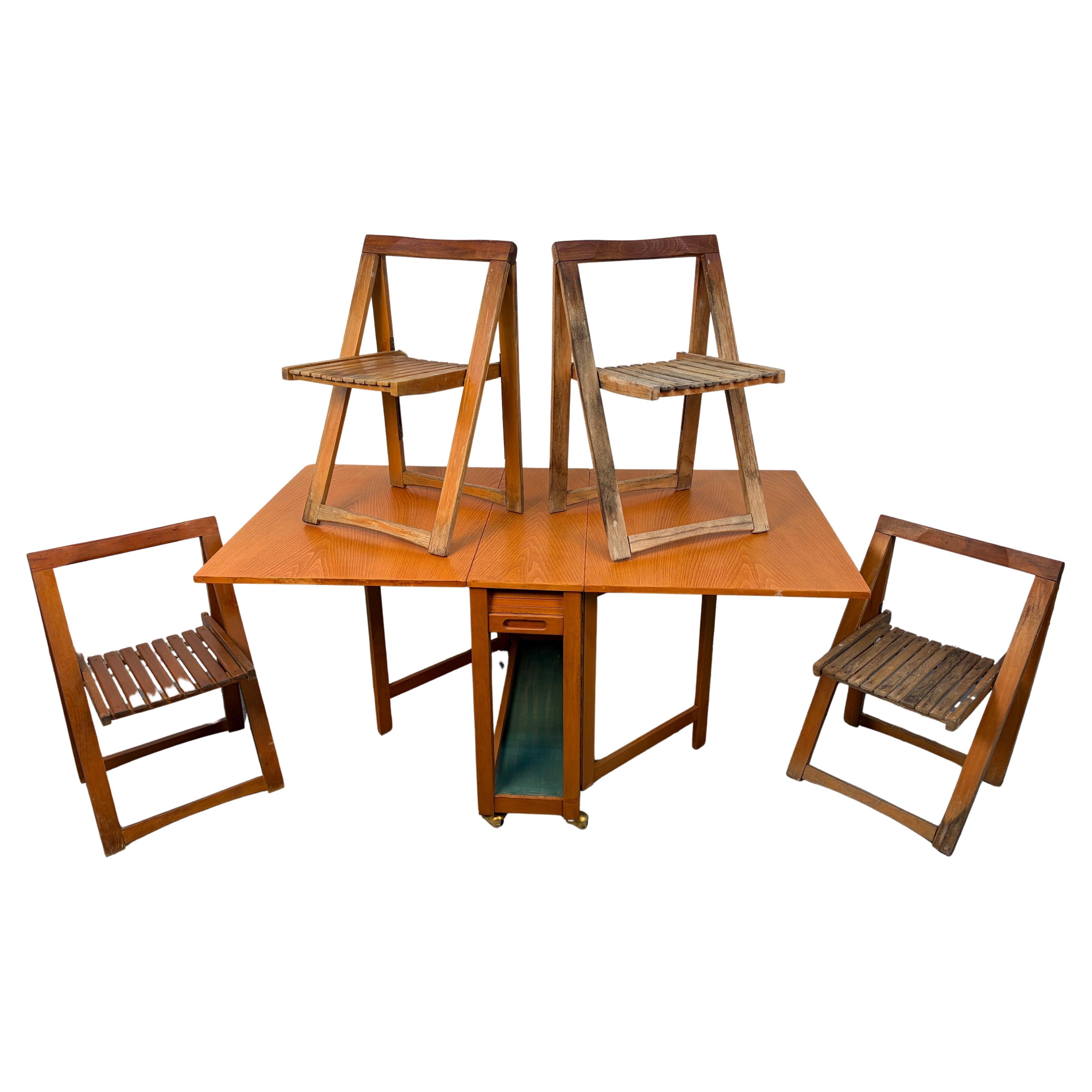 Mid-Century Romanian Drop Leaf Hide A Way Table w/ Four Folding Chairs For Sale