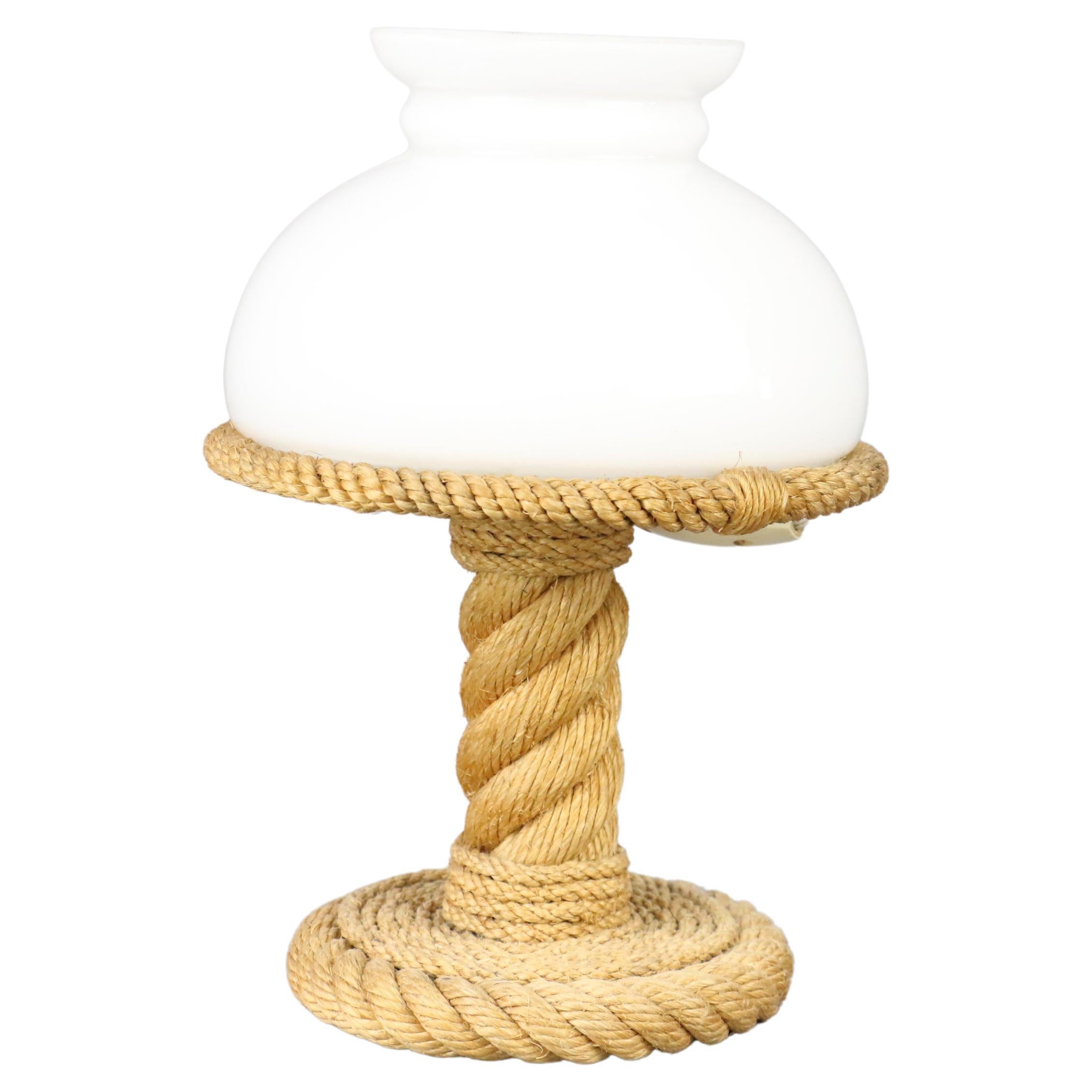 Midcentury Rope and Opaline Lamp by Adrien Audoux and Frida Minet, circa 1960

Rare lamp by the French and Swiss designers Adrien Audoux and Frida Minet. This model is really rare. 
The light produced by this lamp is very warm. This makes it a