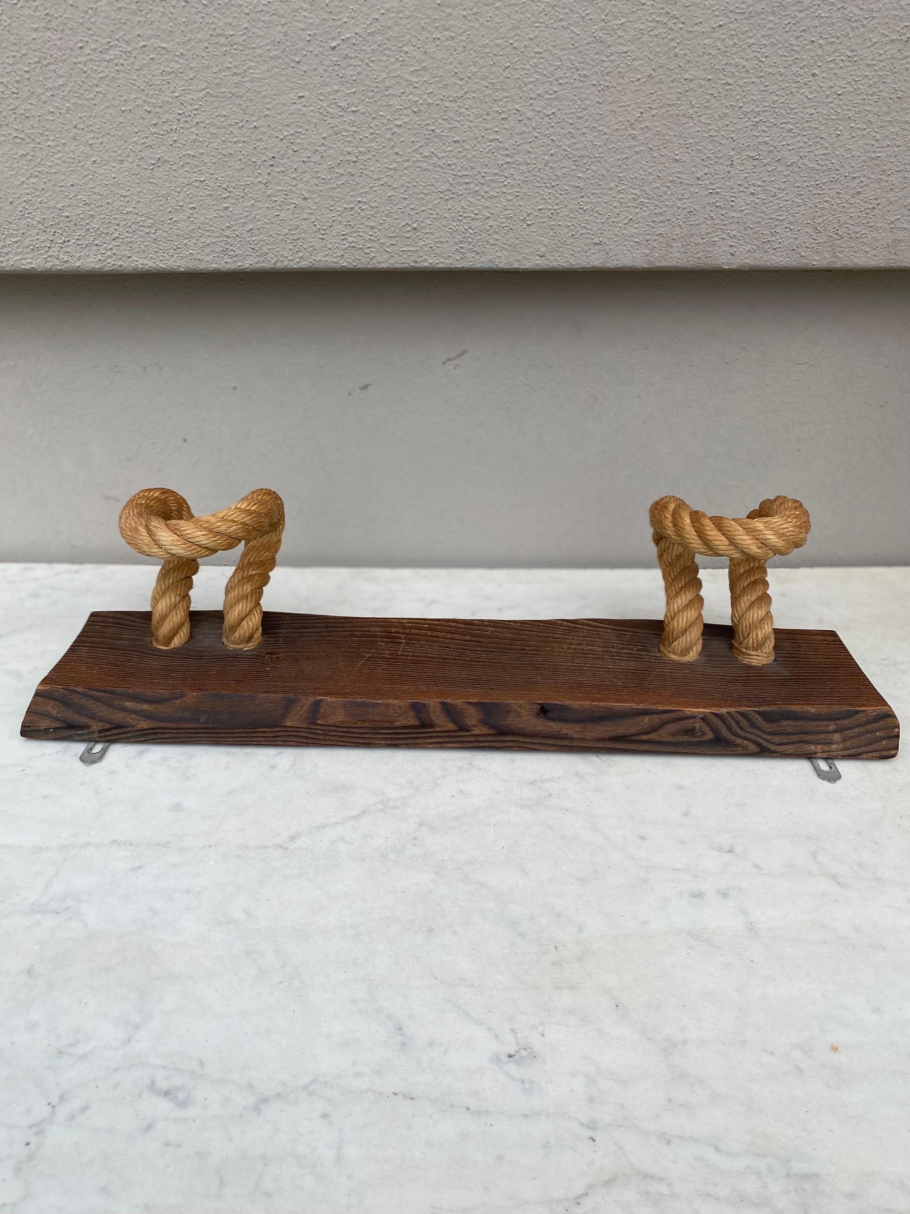 Mid-century rope coat rack by Adrien Audoux & Frida Minet.
Measures: Height / 5 inches.
Width / 18 inches.
  