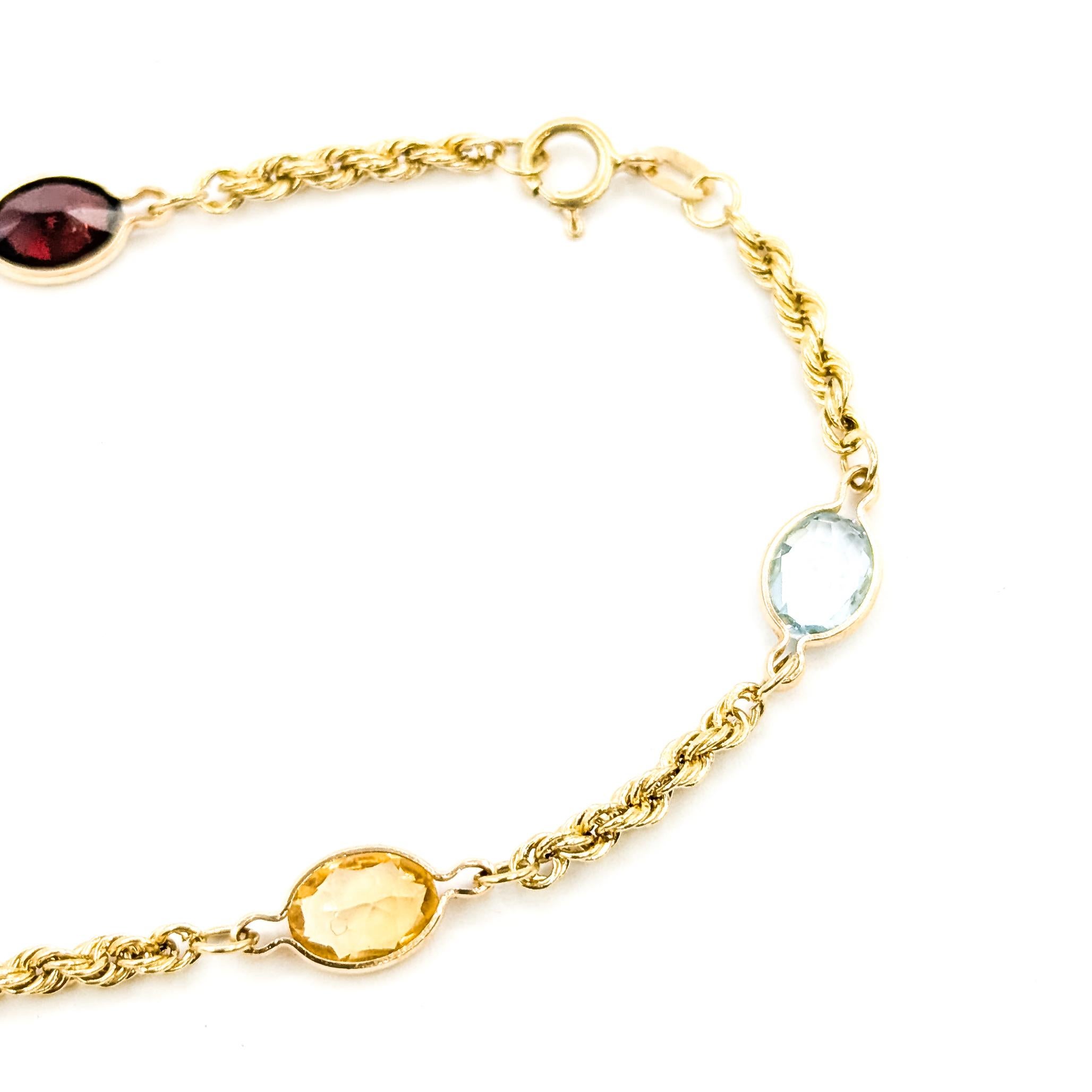 Pulsera de eslabones de cuerda de oro amarillo de 14 quilates con varias piedras preciosas de mediados de siglo Corte oval en venta