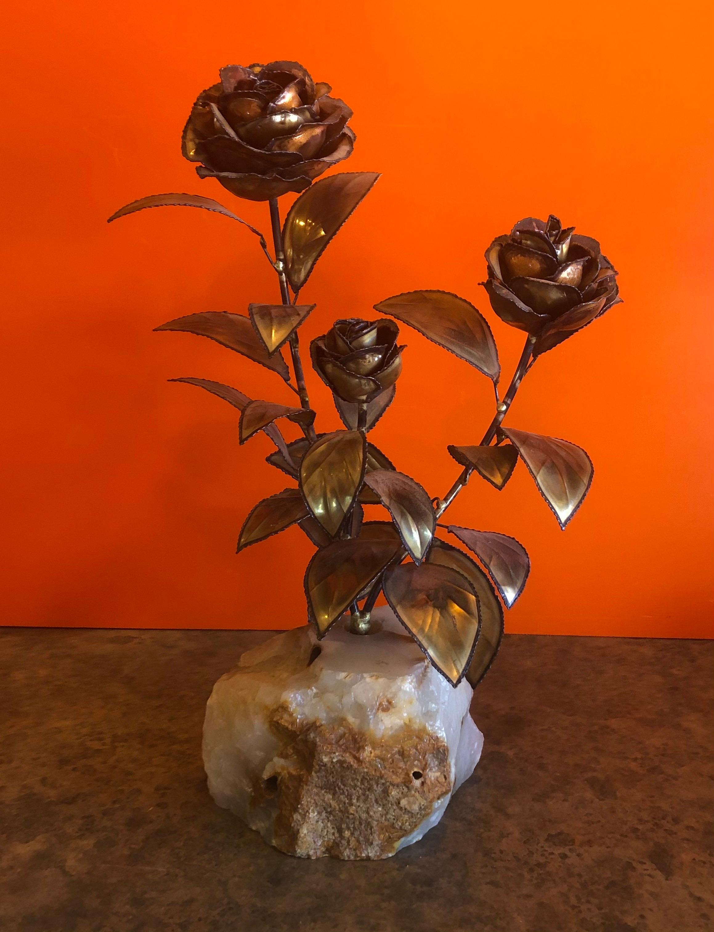 Midcentury rose floral sculpture on quartz base in the style of C. Jere, circa 1970s. The piece is in very good vintage condition and measures: 10