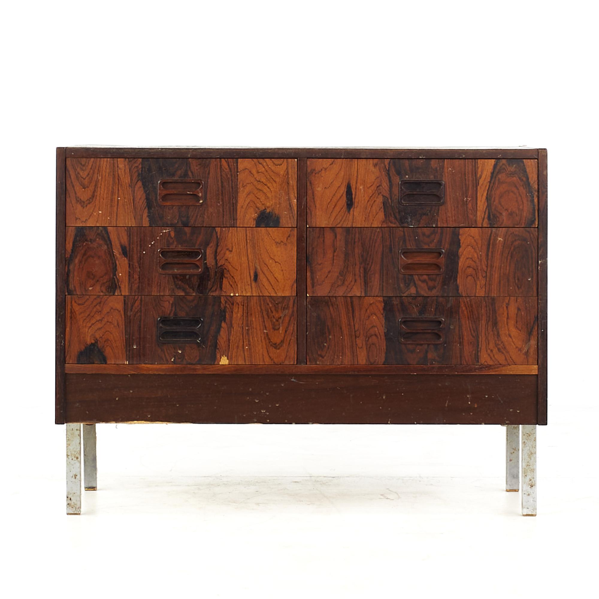 Mid Century Rosewood and Chrome Danish dresser chest of drawers

This dresser measures: 34.25 wide x 16.5 deep x 25.75 inches high

All pieces of furniture can be had in what we call restored vintage condition. That means the piece is restored
