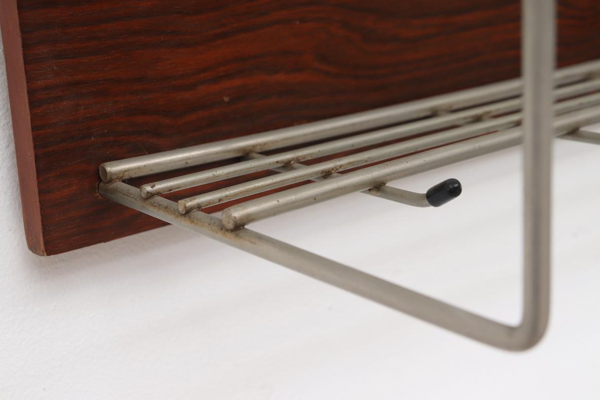 Mid-Century Rosewood and Metal Wall Mounted Coat Rack In Good Condition For Sale In Los Angeles, CA