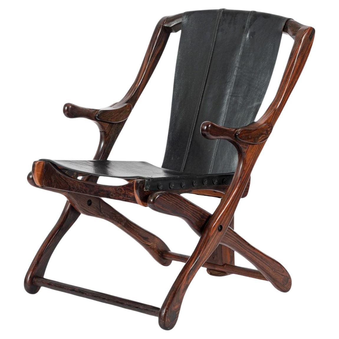 Mid Century Rosewood 
Black Leather Folding Lounge Chair by Don Shoemaker For Sale