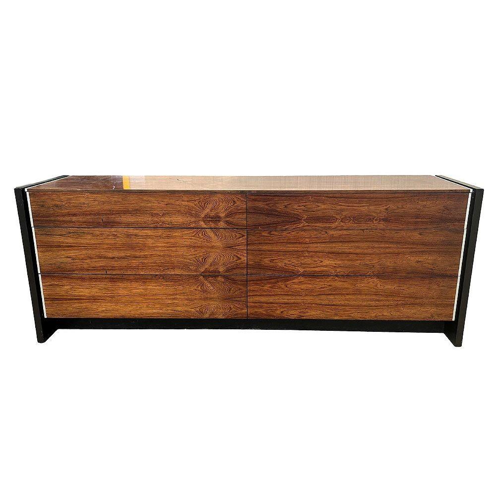 This Postmodern Rosewood and Chrome Dresser by Robert Baron for Glenn of California. The dresser features a Long sleek minimalist dresser credenza having six-book matched richly grained rosewood drawers with finely machined polished aluminum