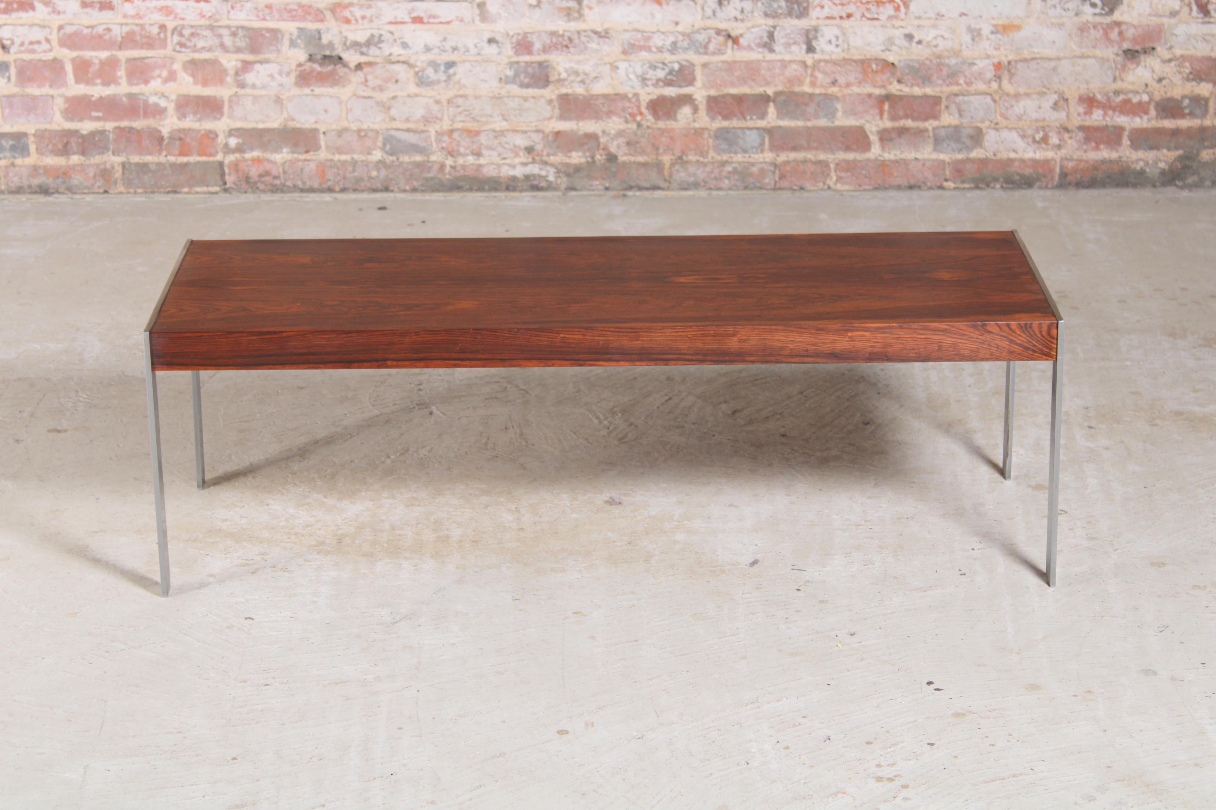 Mid Century rosewood coffee table by Richard Young for Merrow Associates, circa 1970s. Fully restored. 

Dimensions: 122 W x 46 D x 38 H cm.