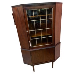 Used Mid Century Rosewood corner cabinet glass door