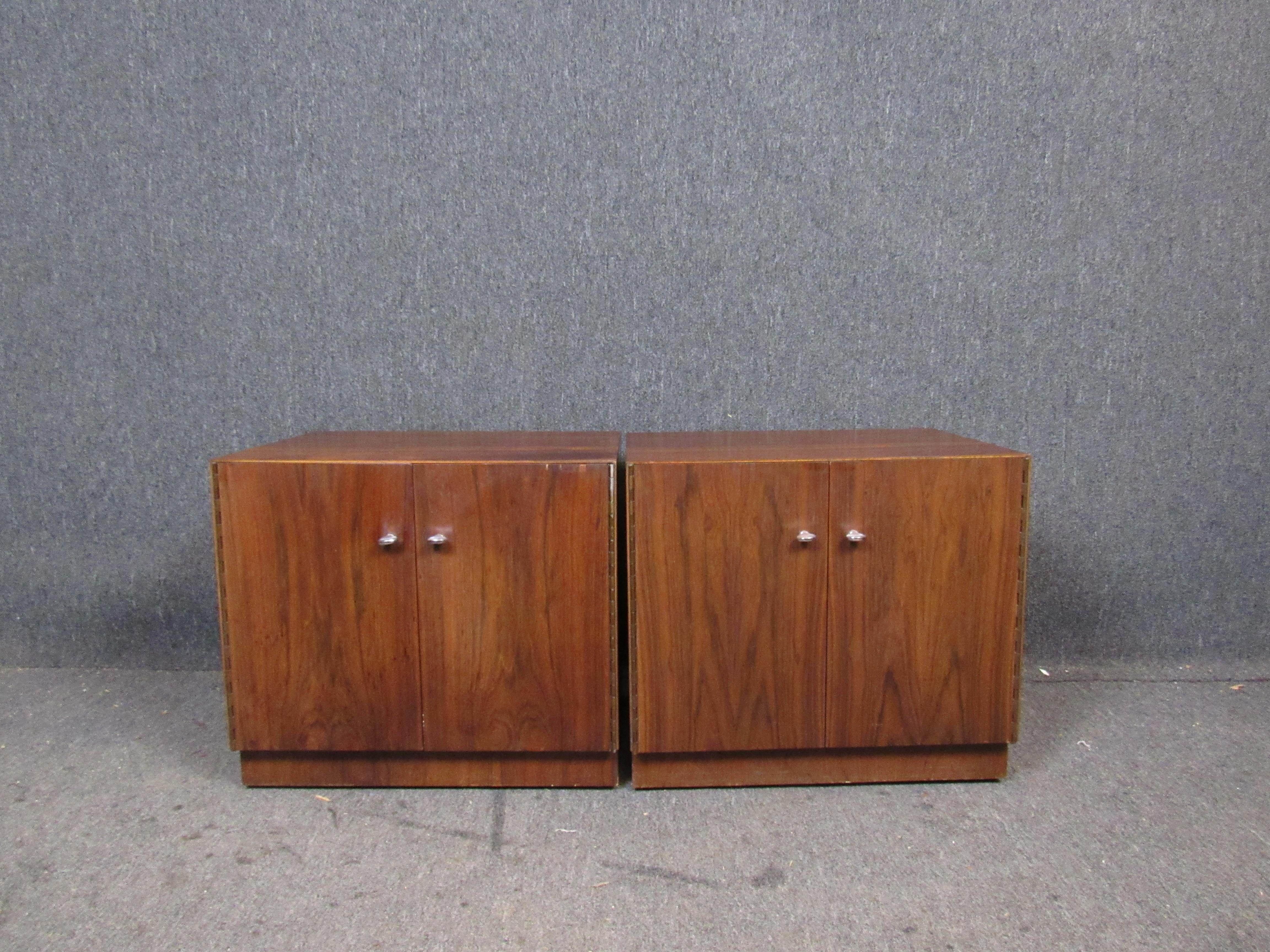 It's hip to be square with this awesome pair of cubic nightstands! Featuring a stunning rosewood wood grain and double doors that open to reveal ample storage space. Great for stacking to make the most of tight spaces. Please confirm item pickup
