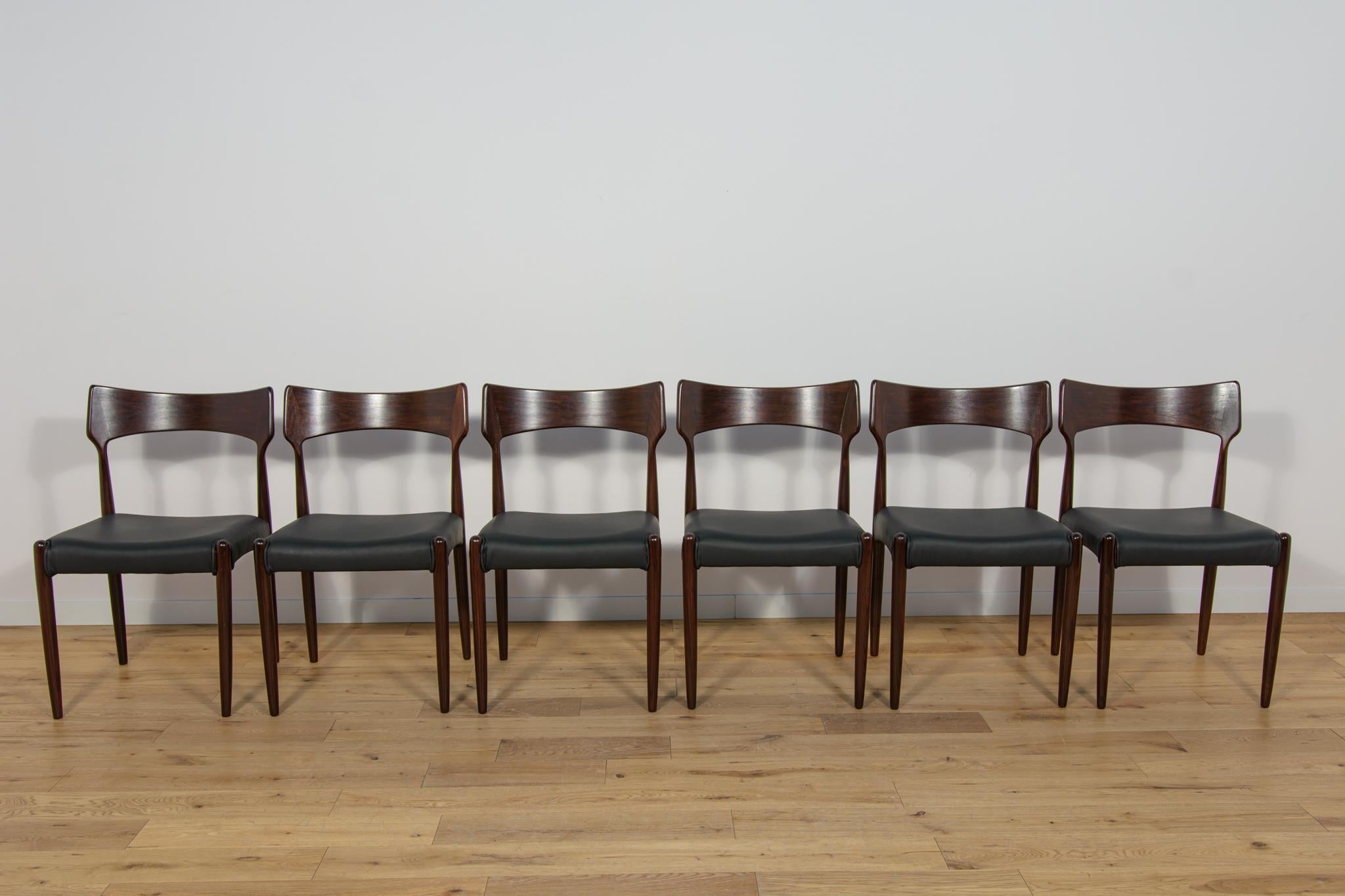 A set of six unique rosewood chairs produced by the Danish manufacture Bernhard Pedersen & Son in the 1960s. Elegant chairs with an interesting form. Rosewood has been cleaned from the old surface and finished with high-quality Danish oil.