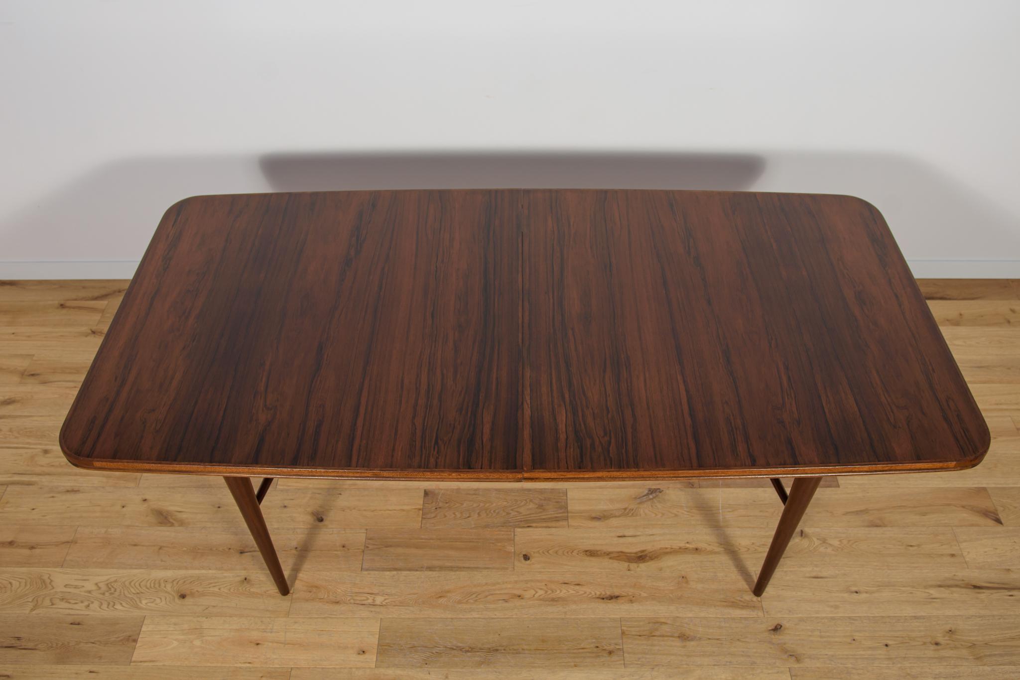 Woodwork Mid-Century Rosewood Dining Table Table by Robert Heritage for Archie Shine. For Sale