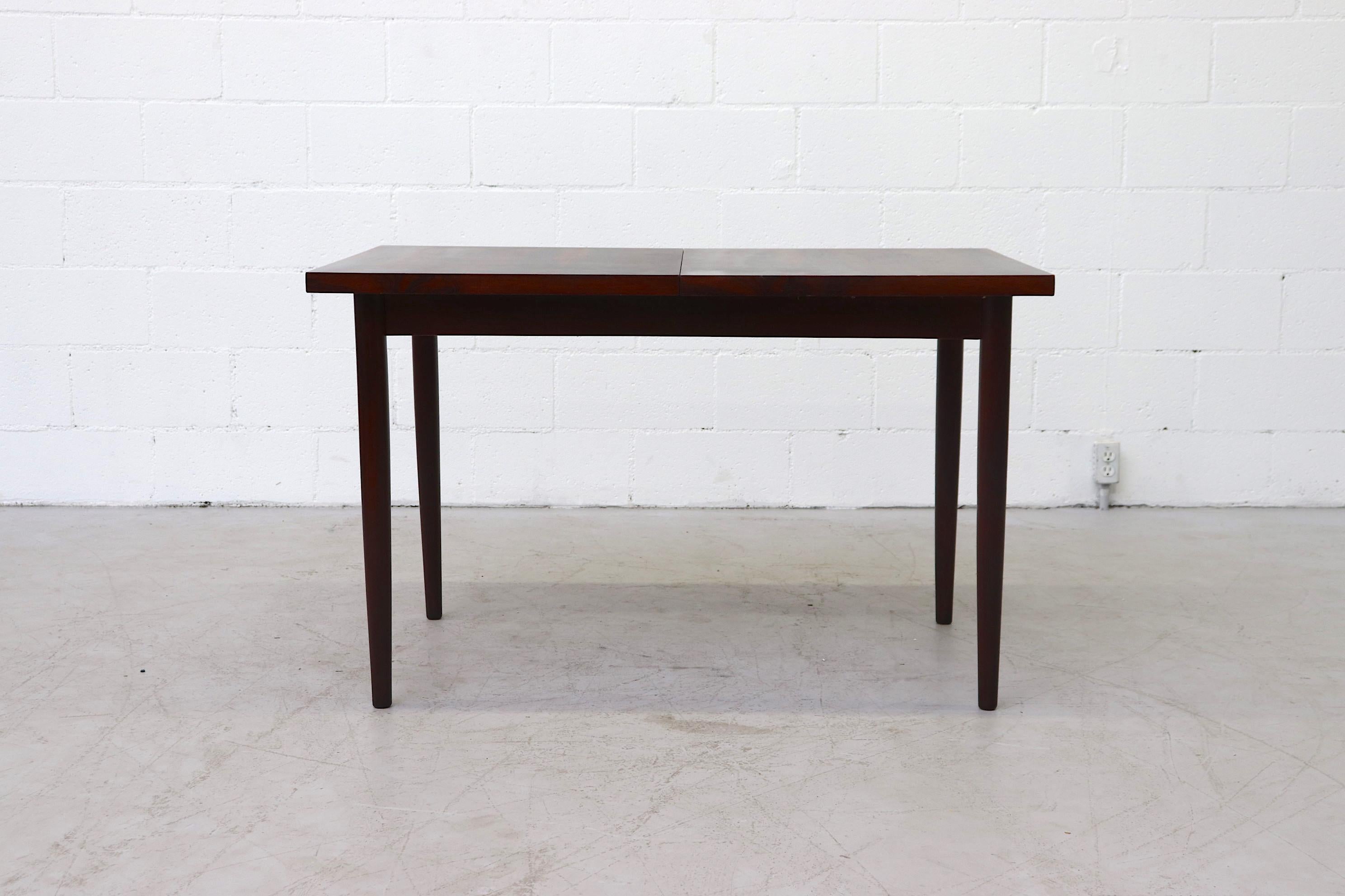 Mid-20th Century Midcentury Rosewood Dining Table with Hidden Leaf
