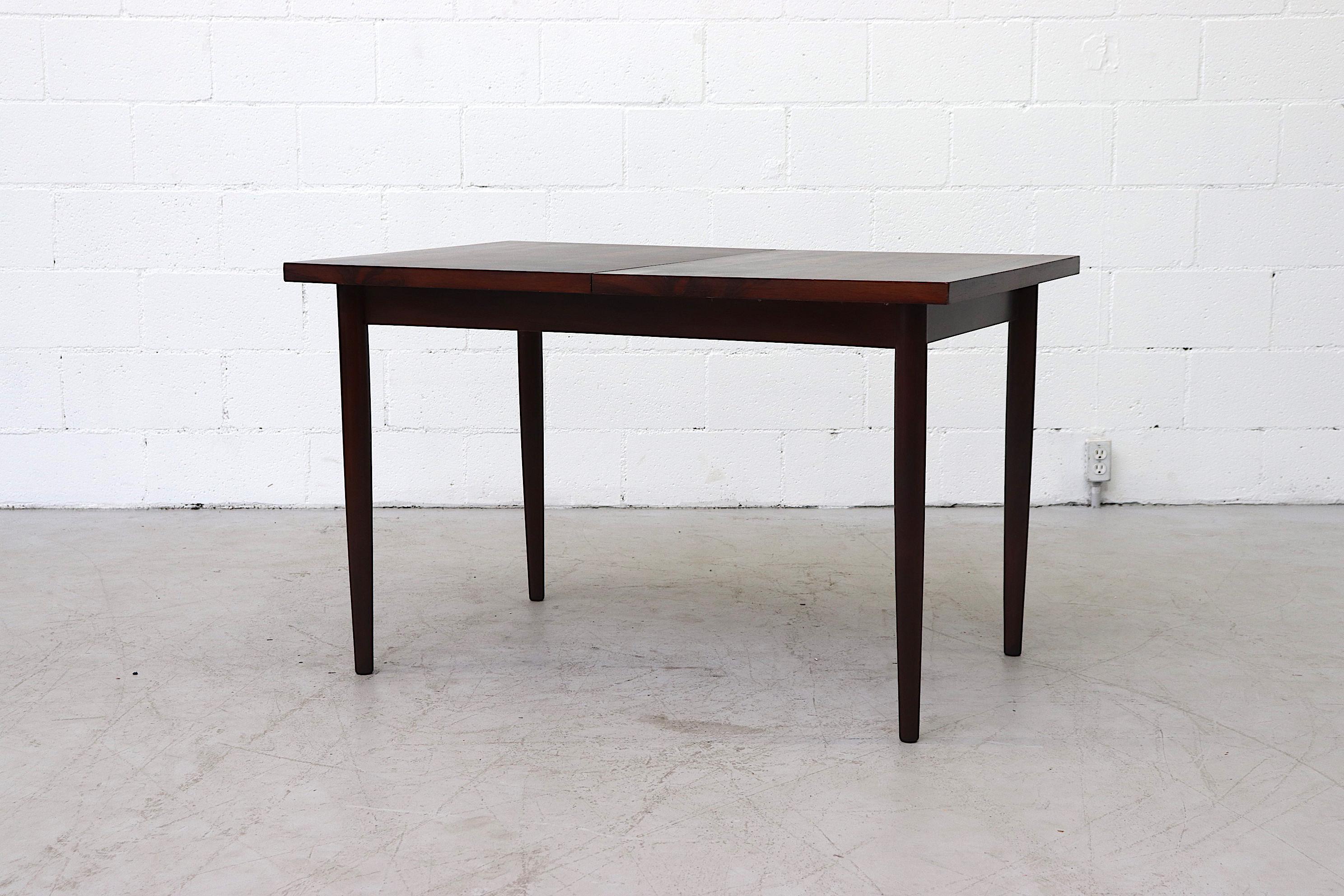 Midcentury Rosewood Dining Table with Hidden Leaf 1